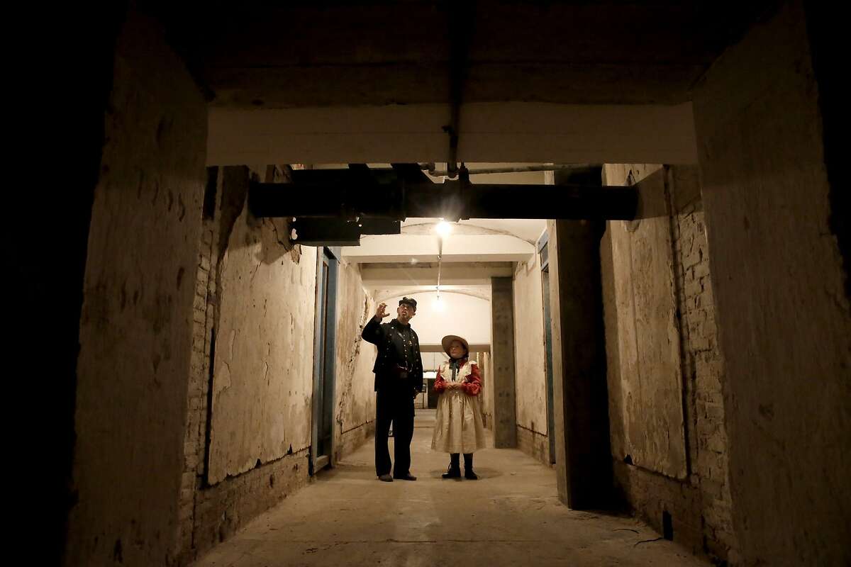 Grant Coffin and Megan Putman, 10 dressed in Civil War character clothing as they tour the Citadel which is not open to the public, sits directly under the main prison that was used during the military era but was never part of the Federal Prison on Alcatraz Island in San Francisco, Calif., as seen on Wed. July 1, 2015.