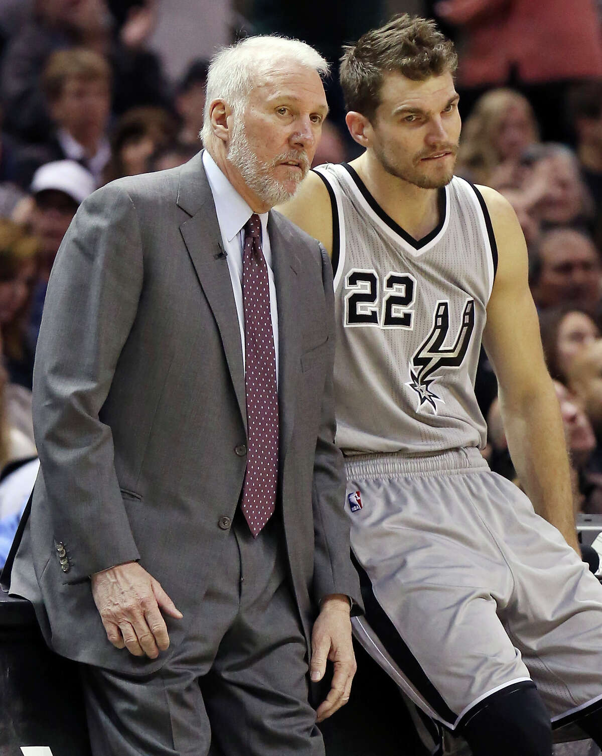 San Antonio Spurs head coach Gregg Popovich (left) talks with Tiago Splitter during first half action against the Los Angeles Clippers Saturday Jan. 31, 2015 at the AT&T Center.