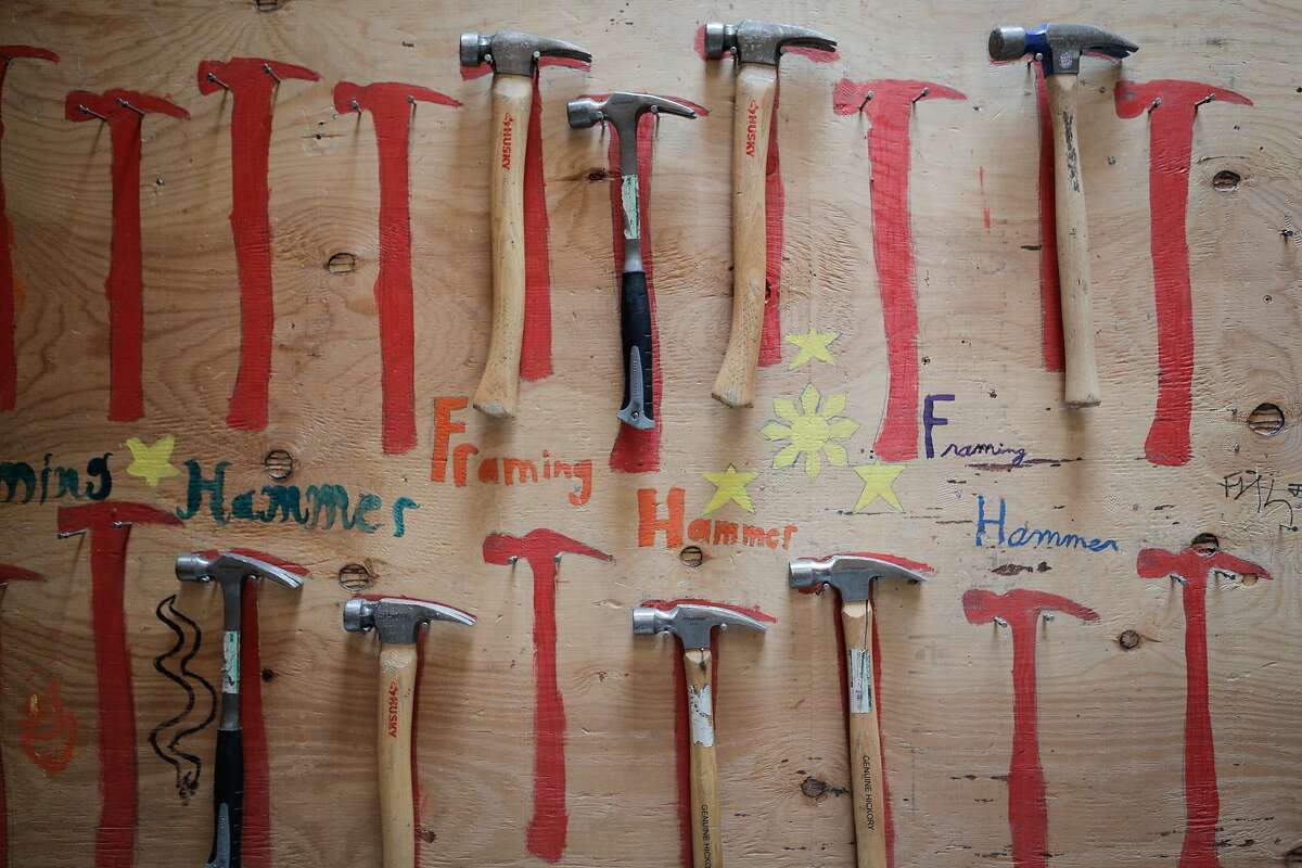 Hammers are seen in the "building and construction trades lab" at O'connell High School in San Francisco, California, on Thursday, July 2, 2015. In the course, students participate in the construction of a tiny home and nearby compost bins.