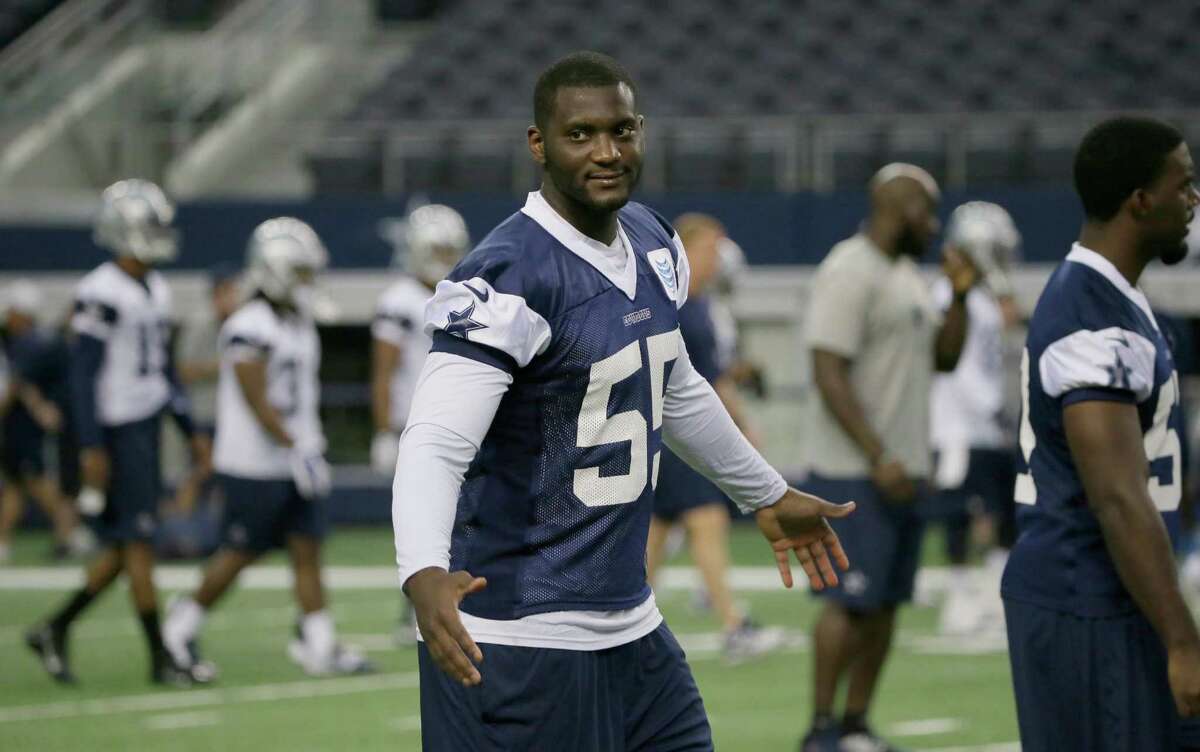 Dallas Cowboys middle linebacker Rolando McClain gestures toward the sidelines during minicamp at the team’s stadium in Arlington on June 17, 2015.