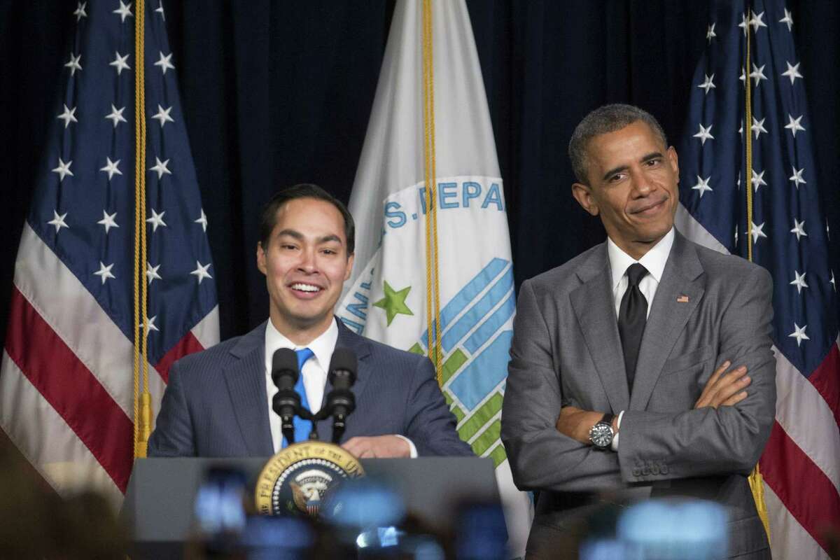 President Barack Obama, right, gestures to Julian Castro, secretary of U.S. Housing and Urban Development (HUD), as they arrive to speak at the Department of Housing and Urban Development on July 31, 2014 in Washington, D.C. Castro, the former San Antonio, Texas mayor, was sworn in this week and will begin his duties on Monday, Aug. 4. (Photo by Andrew Harrer-Pool/Getty Images)