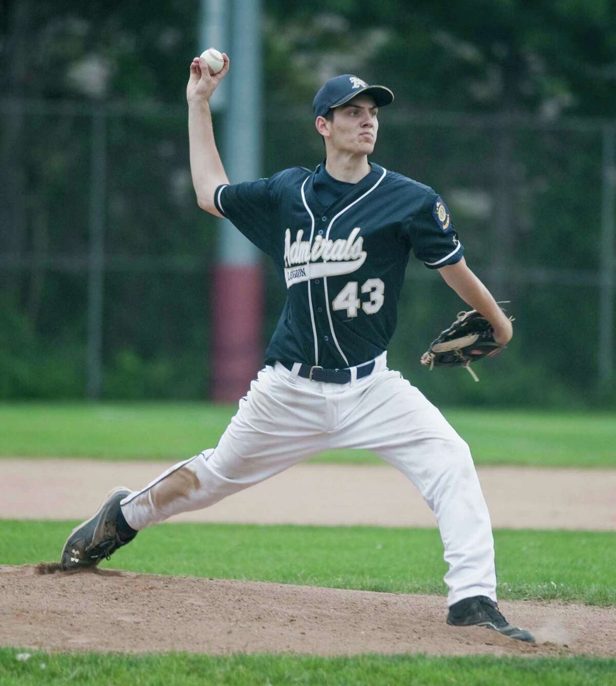 Bethel Admirals pitcher Tom Parker delivering the ball against New Milford in a Senior Legion Baseball game played at Bethel High School. Thursday, July 2, 2015