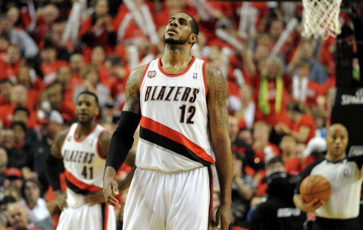Free-agent LaMarcus Aldridge agreed to sign a four-year, $84 million contract with the San Antonio Spurs, July 4, 2015.