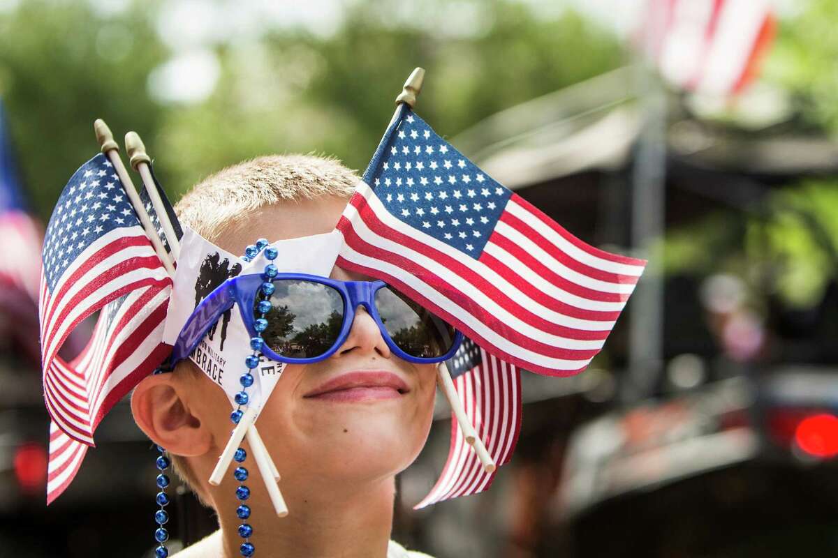 Damien Hagan shows off his patriotism at The Woodlands' South ﻿County 4th of July Parade.﻿