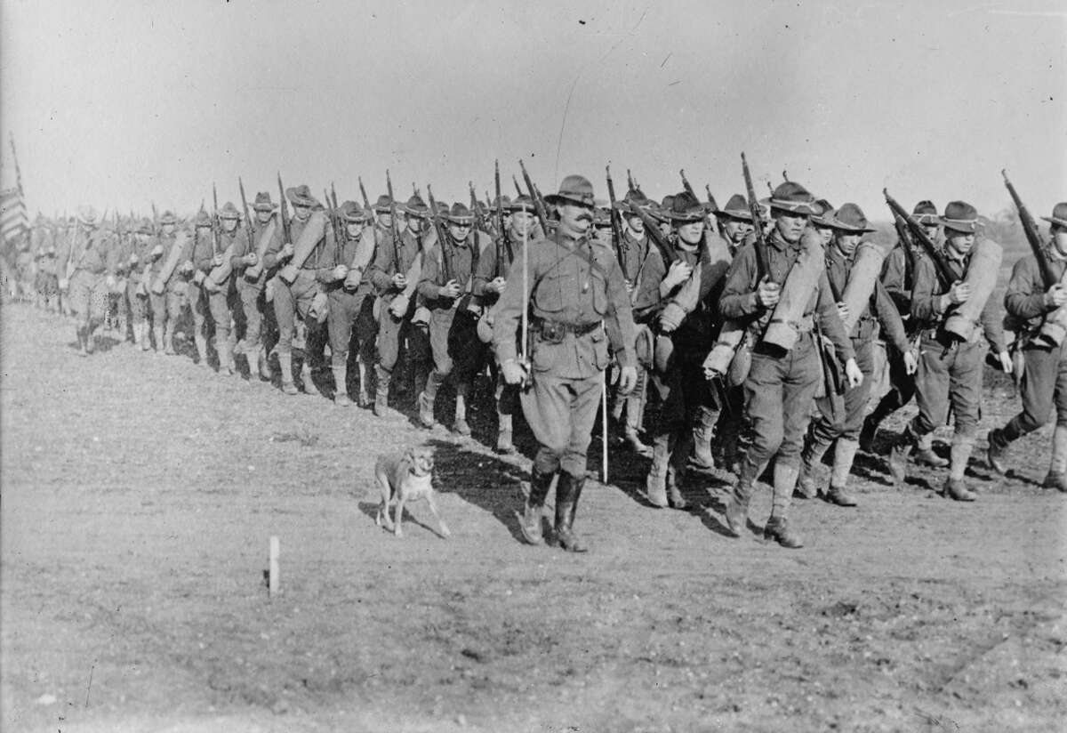 Marching U.S. Infantry in Texas in 1900 are massed for the Mexican border campaign. The U.S. was prepared to enter Mexico with Infantry to capture Pancho Villa.