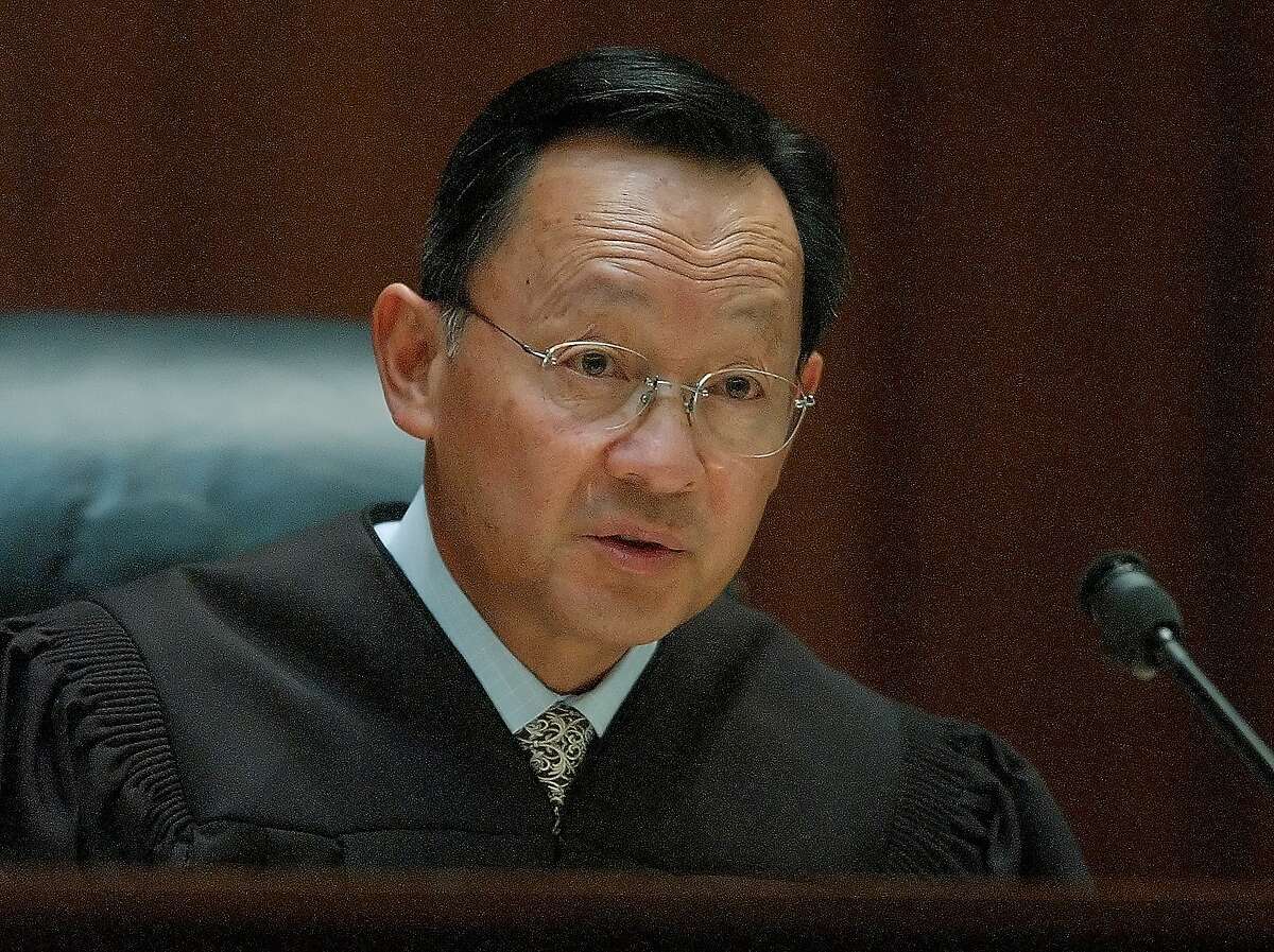 California Supreme Court Justice Ming Chin speaks in a San Francisco courtroom in this May 25, 2004, photo. Justice Chin, recovering from January 2006, skull surgery, will be sidelined from taking the bench during oral arguments for what will be the third month in a row when the justices begin holding public sessions in San Francisco Tuesday, March 7, 2006. While the timing of the 63-year-old Chin's return to the public spotlight is uncertain, his absence from the bench is delaying cases and at times causing lower court judges to fill the vacuum. (AP Photo/Paul Sakuma)