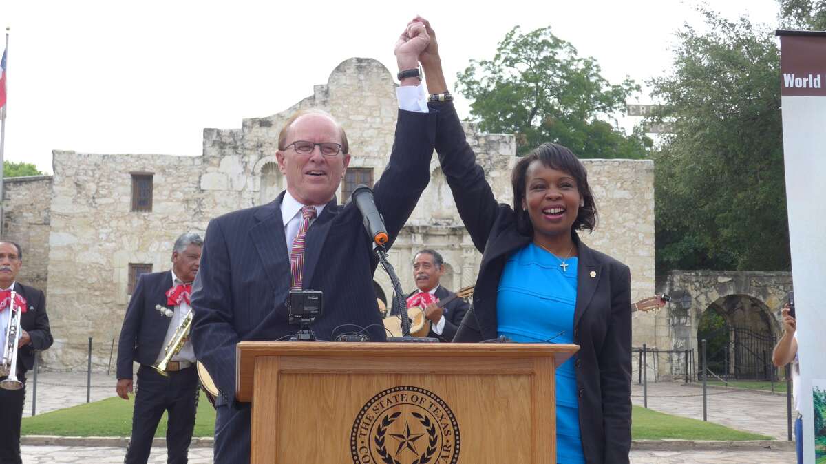 Bexar County Judge Nelson Wolff and Mayor Ivy Taylor celebrate the World Heritage designation for San Antonio's missions at the Alamo on Tuesday morning, July 7, 2015.