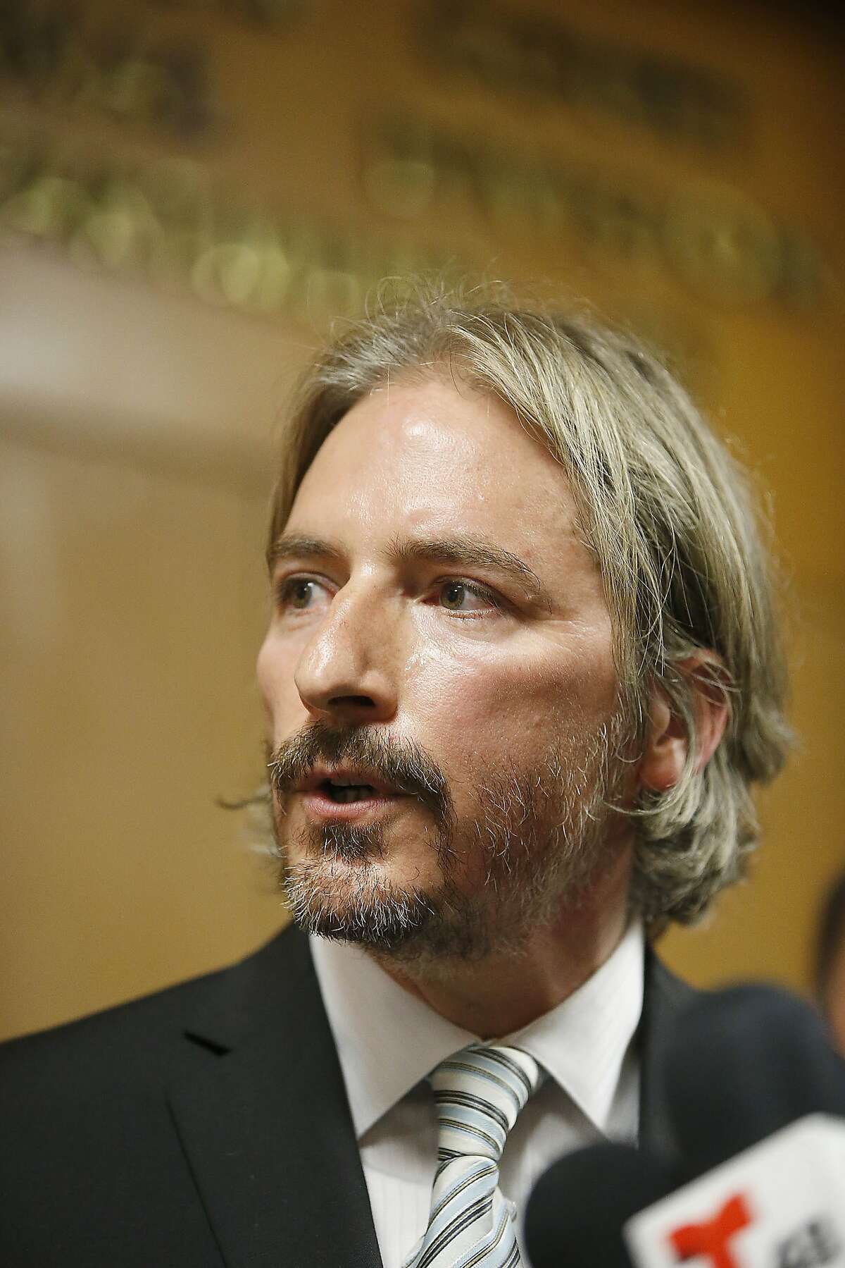 San Francisco Public Defender Matt Gonzalez talks to members of the media after Francisco Sanchez' arraignment Tuesday, July 7, 2015, in San Francisco. Prosecutors have charged Sanchez, a Mexican immigrant, with murder in the waterfront shooting death of 32-year-old Kathryn Steinle. (AP Photo/Tony Avelar)