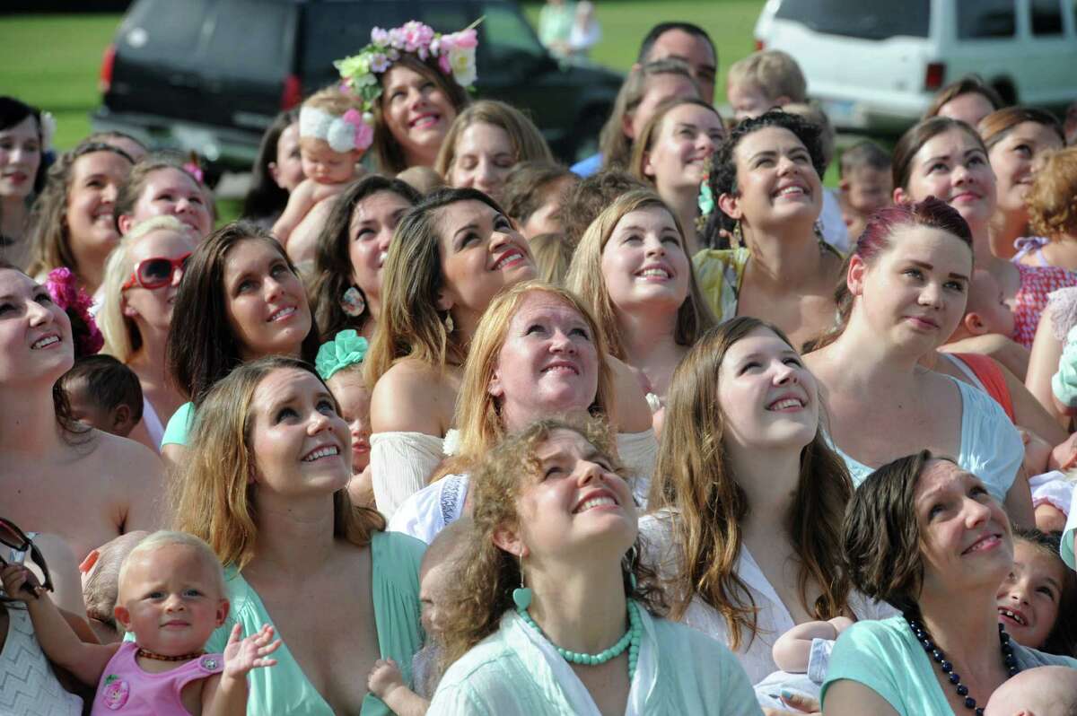 Local moms take on breastfeeding stigma with group photo