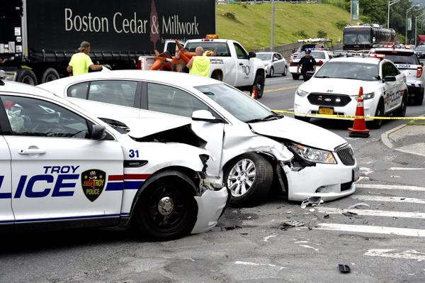 Troy crash injures police officer