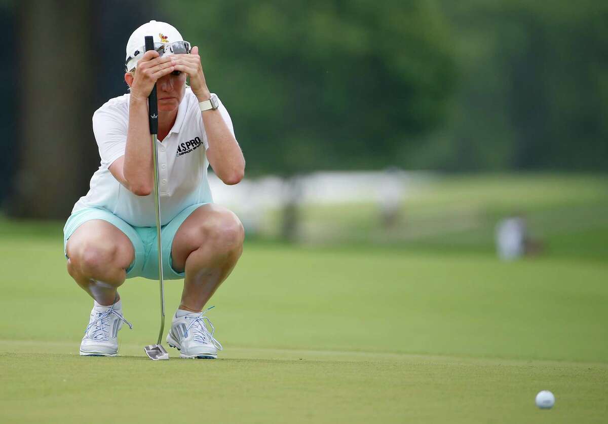 Karrie Webb of Australia lines up a putt on the ninth hole during the first round of the U.S. Women's Open golf tournament at Lancaster Country Club, Thursday, July 9, 2015 in Lancaster, Pa. (AP Photo/Gene J. Puskar) ORG XMIT: USO137
