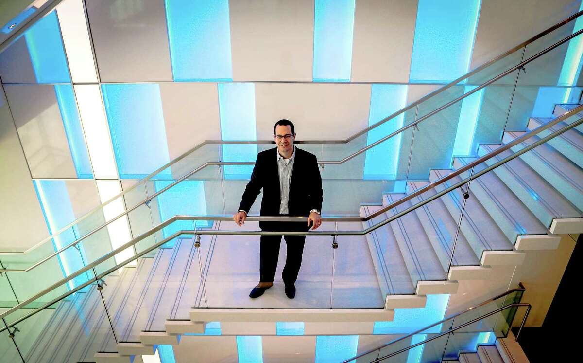 Jeremy Fingeret, senior managing director of Houston-based alliantgroup at the company's headquarters, Wednesday July 8. 2015. Alliantgroup's building opened in January of 2014 and they occupy the top floors, 17 through 20, and are in the process of building out the 16th floor with a gym. Alliantgroup helps small to mid-size businesses take advantage of tax credits such as the 179D tax credit for energy-efficient buildings. As one of the few LEED Platinum buildings in Houston, their offices showcase the latest in energy efficiency and design as a nice work environment for employees. Floor-to-ceiling windows, coated with a film to keep the heat out and the cool air in, allow natural light for workers to enjoy. The offices are in the middle of the building so everyone has access to the natural light. LEED is the U.S. Green Building Council's certification for green buildings and stands for "Leadership in Energy & Environmental Design." (Billy Smith II / Houston Chronicle)