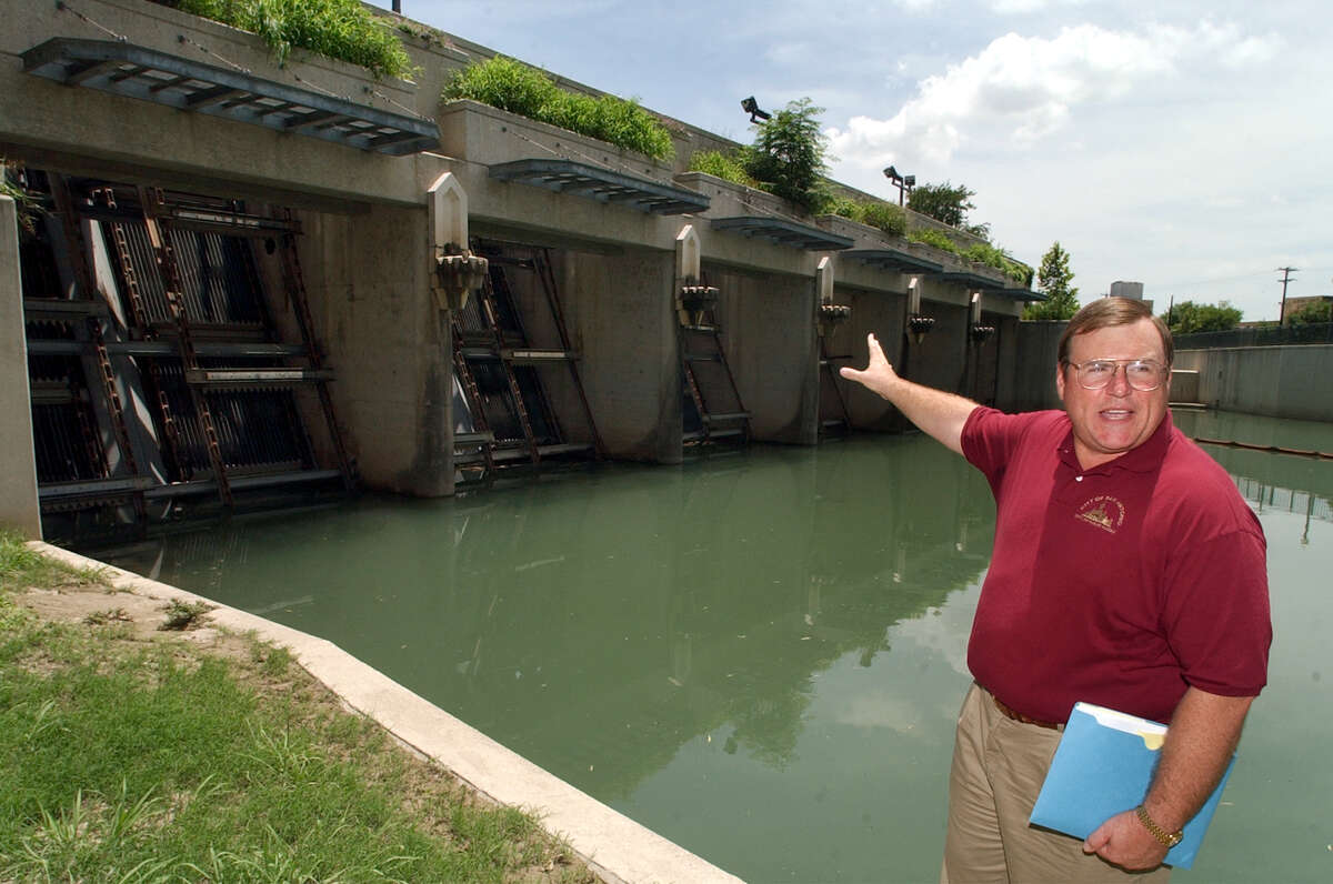 Tom Wendorf, then director of public works, shows the San Antonio River Tunnel inlets in 2002.