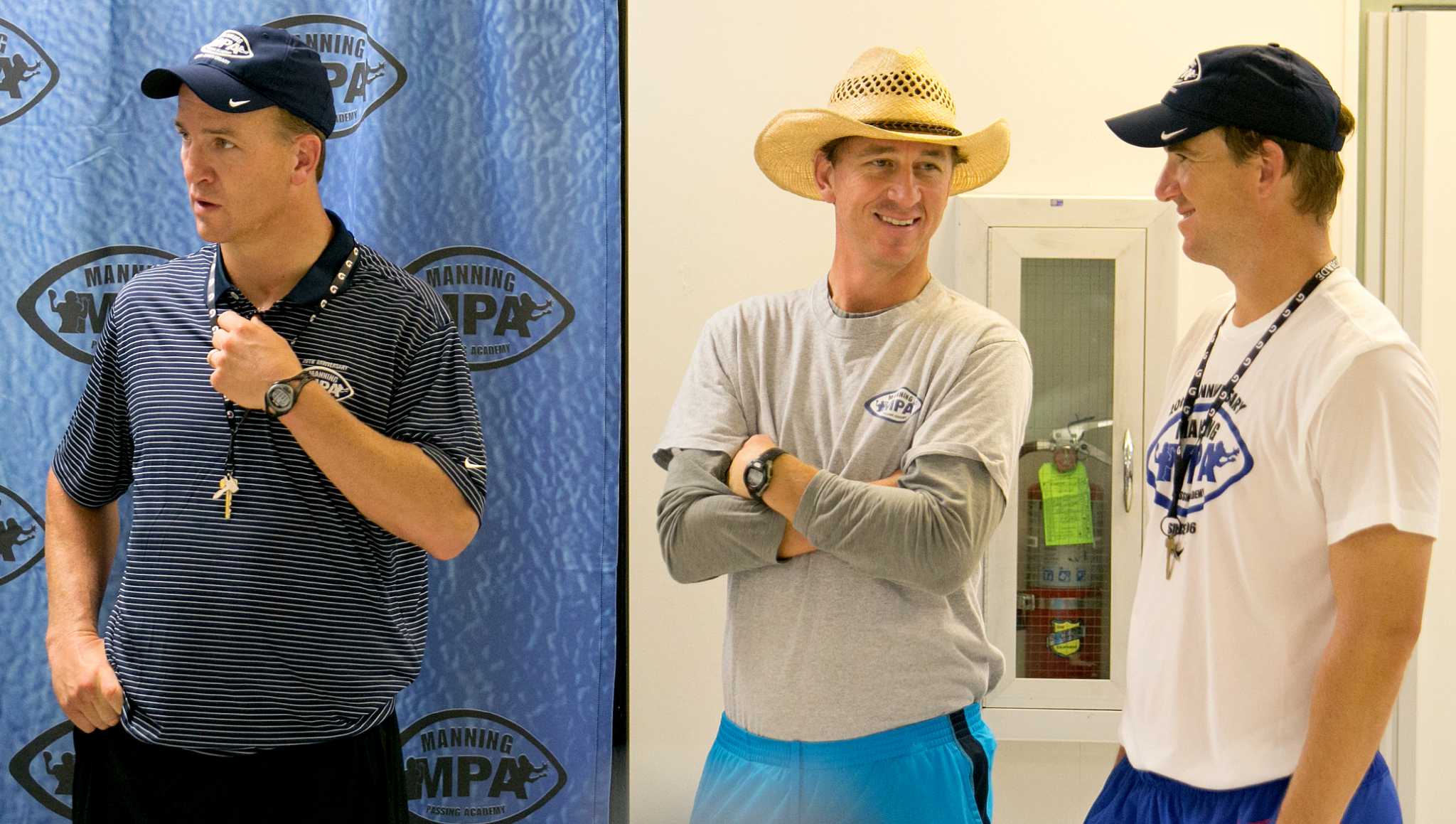 Peyton Manning & Eli Manning wear their new big hats on the