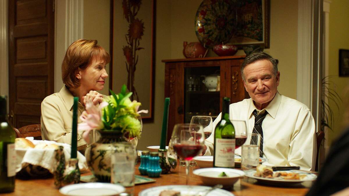 In this image released by Starz Digital, Kathy Baker, left, and Robin Williams appear in a scene from the film, "Boulevard." In the film, Williams plays a closeted gay man who comes out in his 60's and then leaves his lifelong love, his wife of 40 years, played by Baker. (Starz Digital via AP)