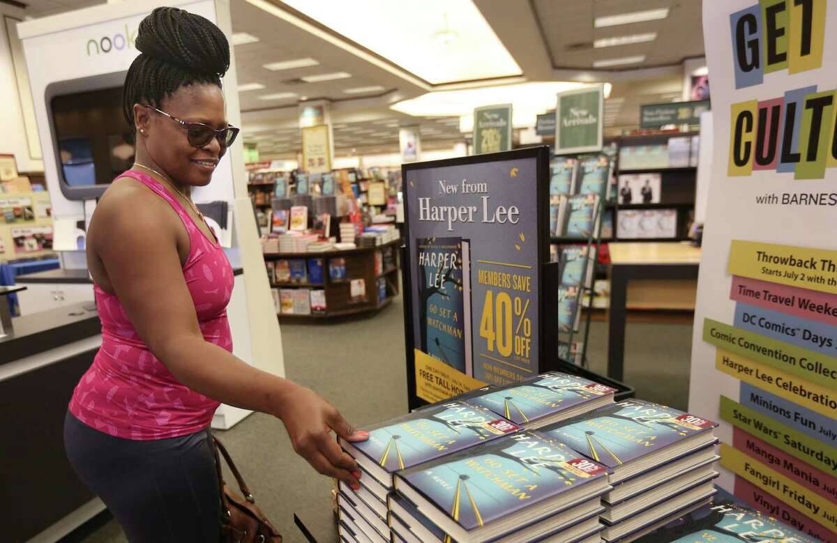 Vernetta Gonzales buys Harper Lee's hotly anticipated second novel, "Go Set a Watchman," at the Holcombe Barnes & Noble on Tuesday.