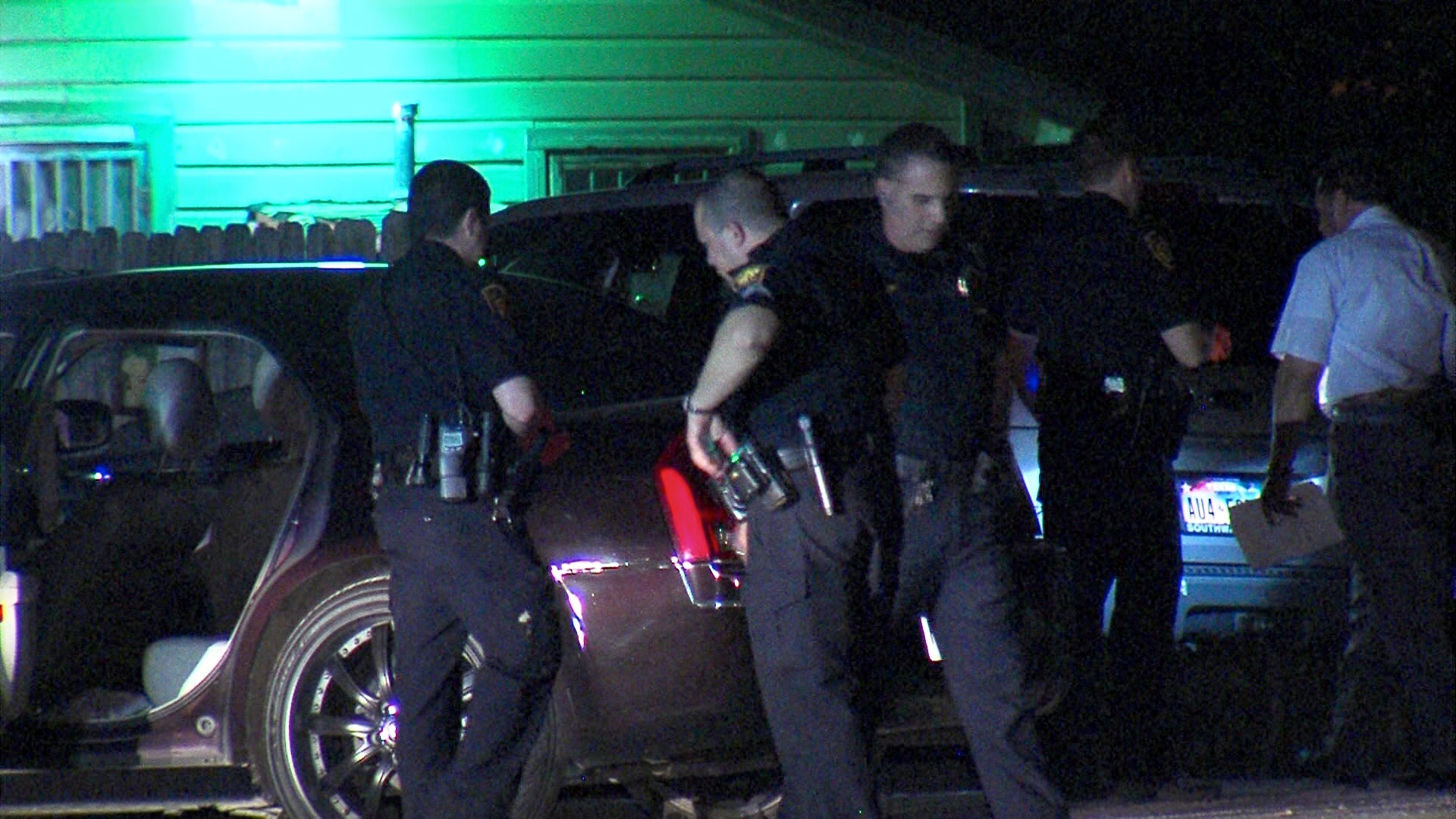 Police searching for suspects after two injured in hail of gunfire on ...