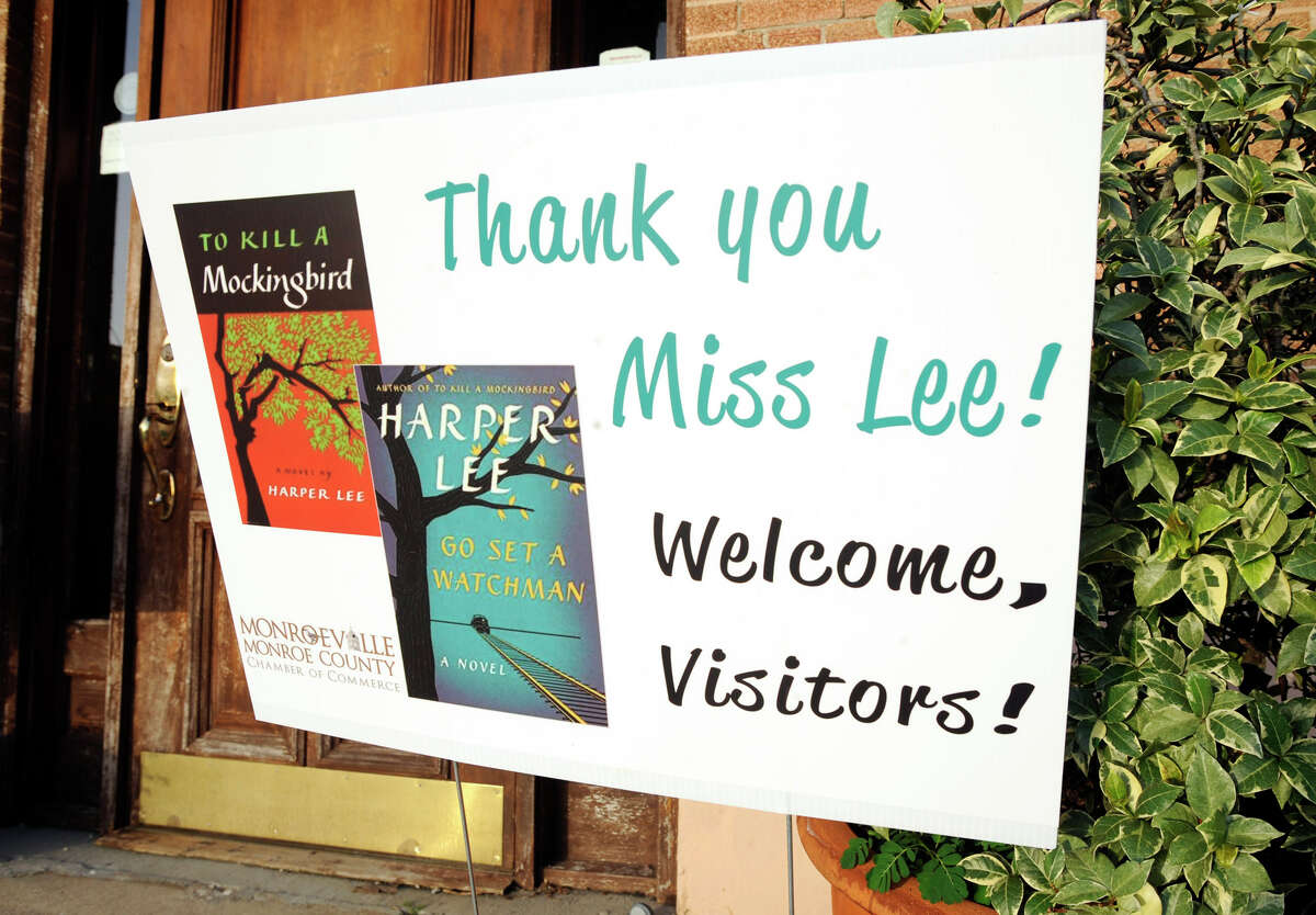 This photo taken Wednesday, July 8, 2015, shows a sign welcoming book fans to Monroeville, Ala., the hometown of "To Kill a Mockingbird" author Harper Lee. Lee's second book "Go Set a Watchman" is set for release July 14, 2015, and town officials are hoping the new novel draws more visitors to the quiet town of 6,300 people. (AP Photo/Jay Reeves)