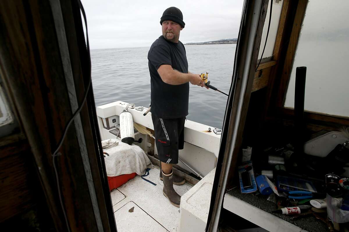 Fisherman Kevin Butler of Santa Cruz, Calif., fishes the waters just a few miles out from the Santa Cruz Harbor, on Wed. July 15, 2015.