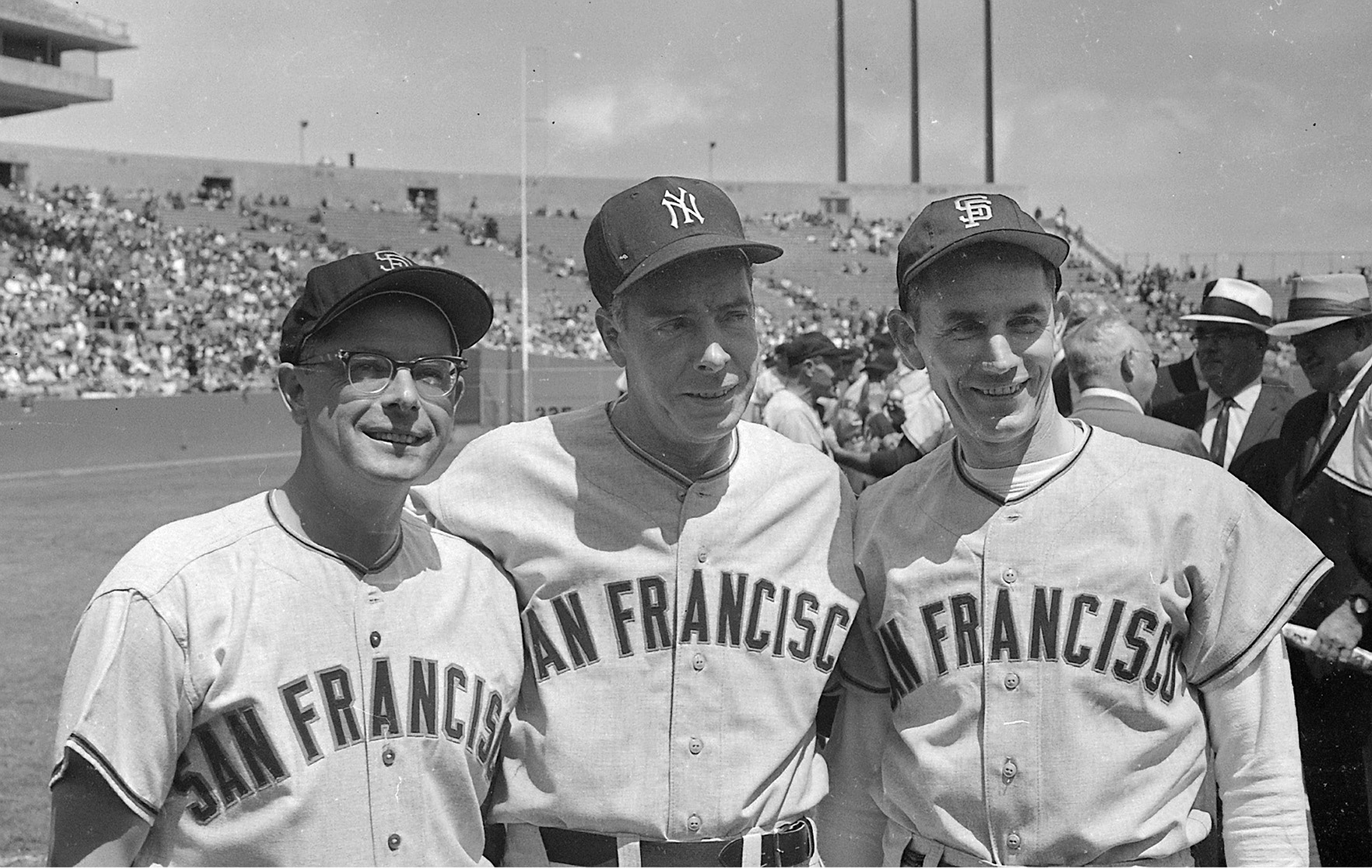 The DiMaggio brothers donned old San Francisco Seals uniforms for  participation in the old-timers game at Candlestick Park preceding the  Giants-Pirates game in San Francisco on August 4, 1962. The brothers are