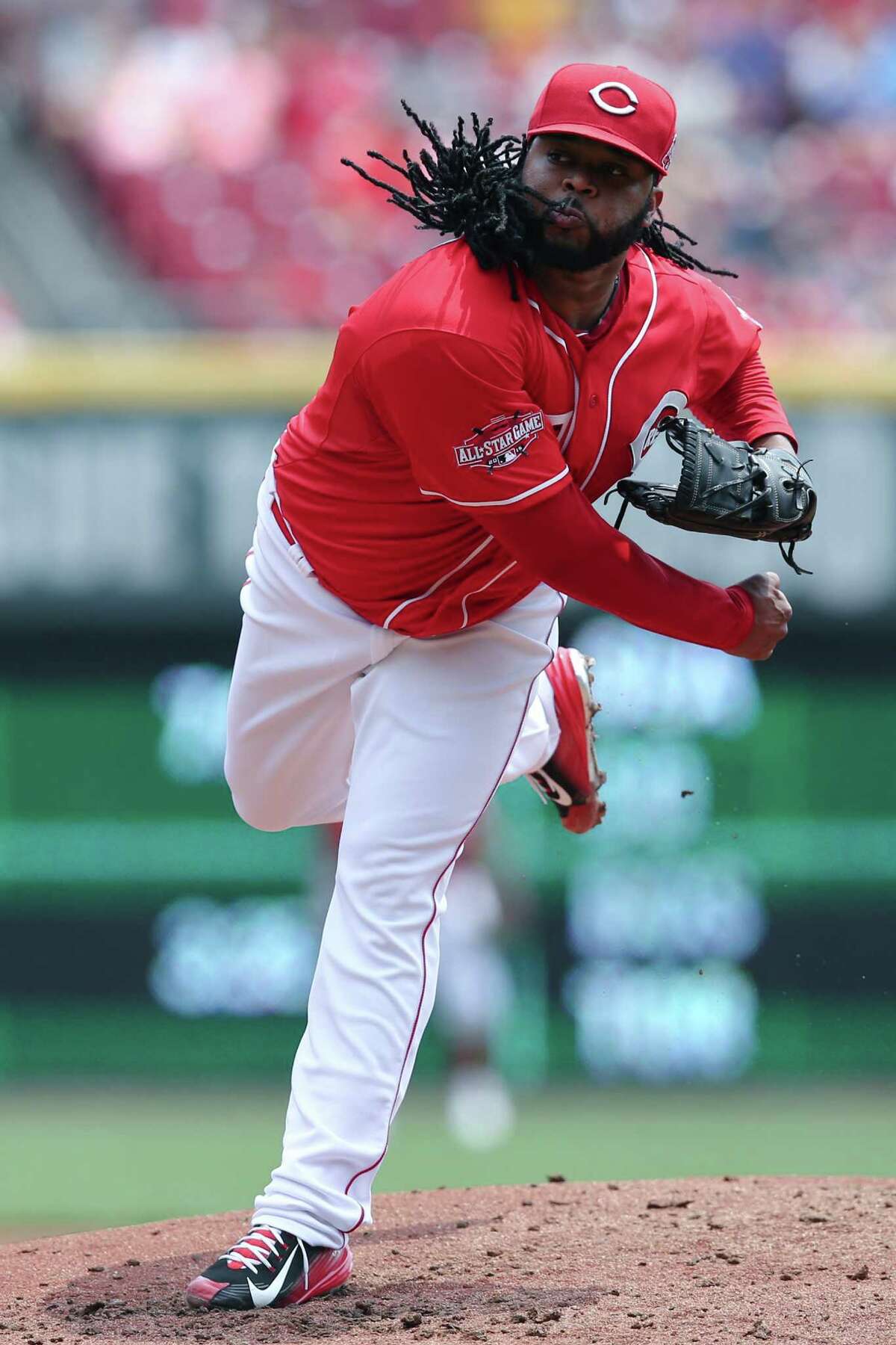 Cincinnati Reds starting pitcher Johnny Cueto throws in the second inning of a baseball game against the Minnesota Twins, Wednesday, July 1, 2015, in Cincinnati. The Reds won 2-1. (AP Photo/John Minchillo)