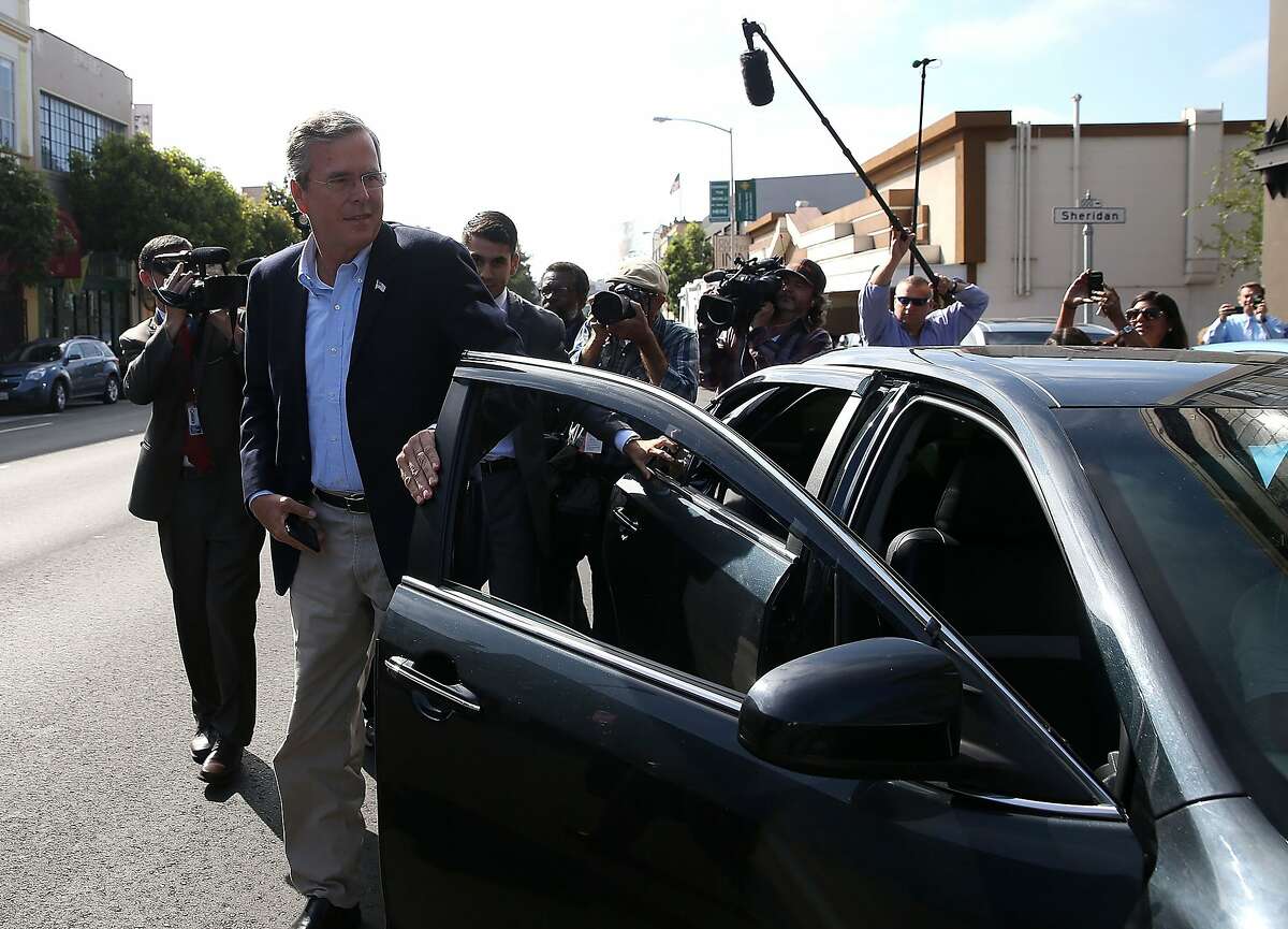 SAN FRANCISCO, CA - JULY 16: Republican presidential candidate and former Florida governor Jeb Bush gets out of an Uber car as he arrives at Thumbtack on July 16, 2015 in San Francisco, California. Republican presidential hopeful Jeb Bush toured Thumbtack, a consumer service company for hiring local professionals. (Photo by Justin Sullivan/Getty Images)