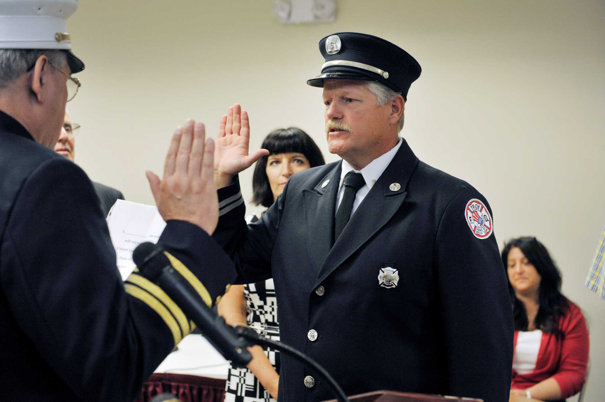 Troy promotes firefighters