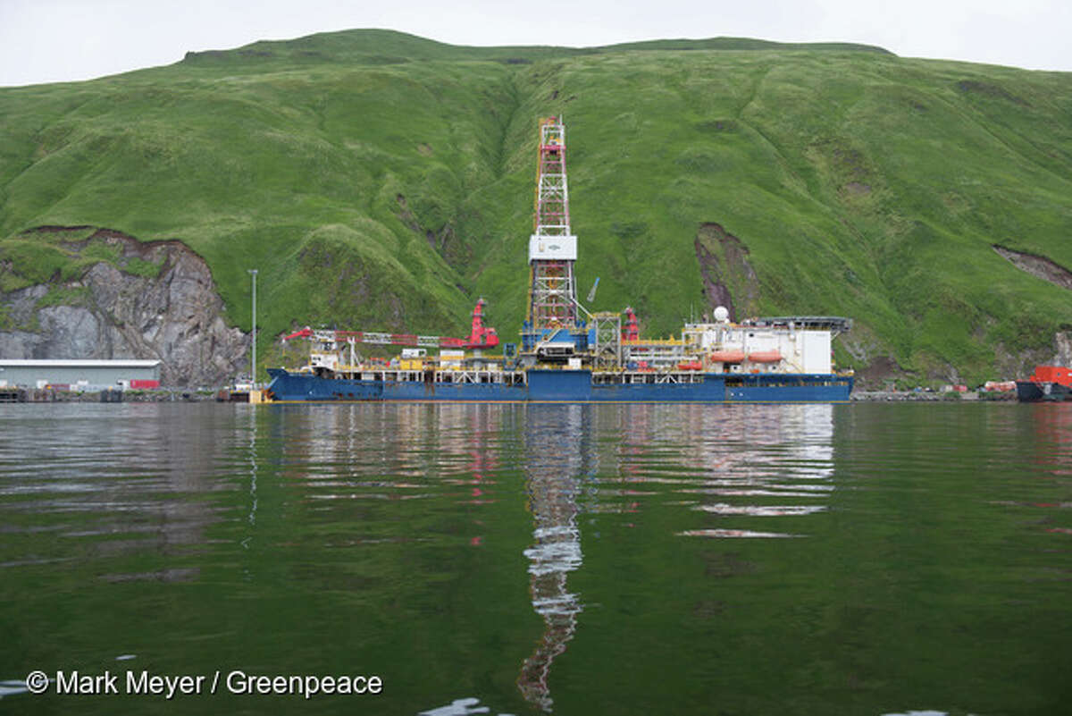 The Noble Discoverer in Dutch Harbor as Shell prepares its equipment for drilling for oil in the Chukchi Sea in the Alaskan arctic., 8.15.34.shell alaska protests, One of Shell's contracted drill ships the Noble Discoverer is tied up in Unalaska's Dutch Harbor, Alaska on July 11, 2015. Shell wants to begin drilling in the Alaskan Arctic, but it first has to transport its rigs through Unalaska, where residents are expressing their concerns. Photo by Mark Meyer/Greenpeace, 8.15.34.shell alaska protests, One of Shell's contracted drill ships the Noble Discoverer is tied up in Unalaska's Dutch Harbor, Alaska on July 11, 2015. Shell wants to begin drilling in the Alaskan Arctic, but it first has to transport its rigs through Unalaska, where residents are expressing their concerns. Photo by Mark Meyer/Greenpeace, 8.15.34.shell alaska protests, One of Shell's contracted drill ships the Noble Discoverer is tied up in Unalaska's Dutch Harbor, Alaska on July 11, 2015. Shell wants to begin drilling in the Alaskan Arctic, but it first has to transport its rigs through Unalaska, where residents are expressing their concerns. Photo by Mark Meyer/Greenpeace