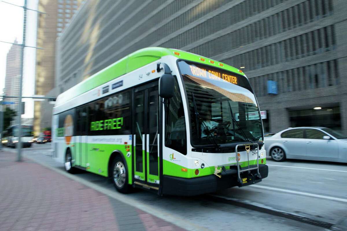 A GreenLink shuttle is seen along Smith Street, Friday, July 17, 2015, in Houston. As Houston continues to develop bigger commercial and office nodes that operate like their own separate downtowns, circulators are making a comeback in a big way. Some, like MetroNational's Memorial City Shuttle and the GreenLink in downtown Houston have operated for years, but keep getting stronger.
