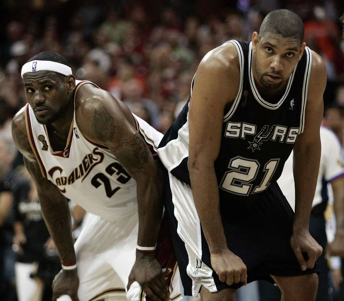 Tim Duncan of the San Antonio Spurs and LeBron James of the Cleveland Cavaliers prepare for a play during Game 4 of the NBA Finals on June 14, 2007, at Quicken Loans Arena in Cleveland, Ohio. The Spurs won 83-82 to sweep the best-of-seven series 4-0.