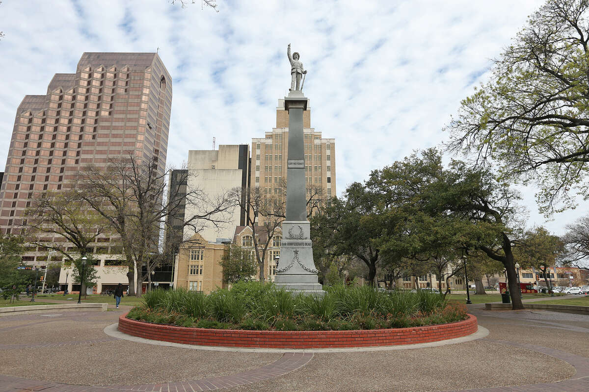 The Travis Park monument is shown in 2013. Like so many others, it faces south.
