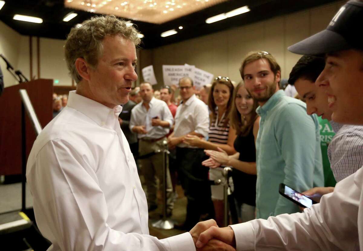 Sen. Rand Paul, R-Ky, greets the crowd after delivering a speech on his tax plan at the Hyatt Regency Friday, July 17, 2015, in Houston, Texas. ( Gary Coronado / Houston Chronicle )