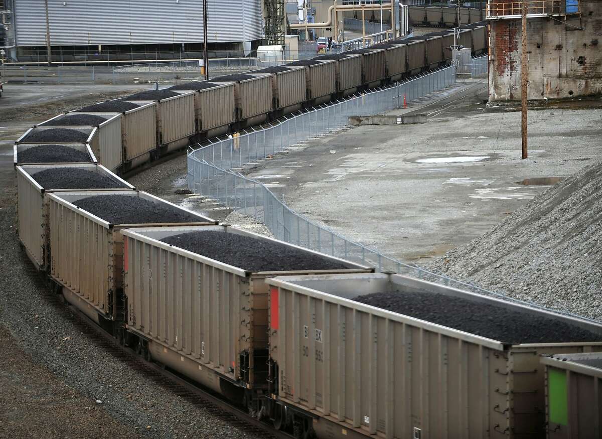 A coal train is heading north through the old Georgia-Pacific site in Bellingham, Washington, March 1, 2011. Rail lines that few people noticed for years are suddenly busy with trains, and the increased traffic has generated a backlash in communities across the country. (Philip A. Dwyer/Bellingham Herald/MCT)