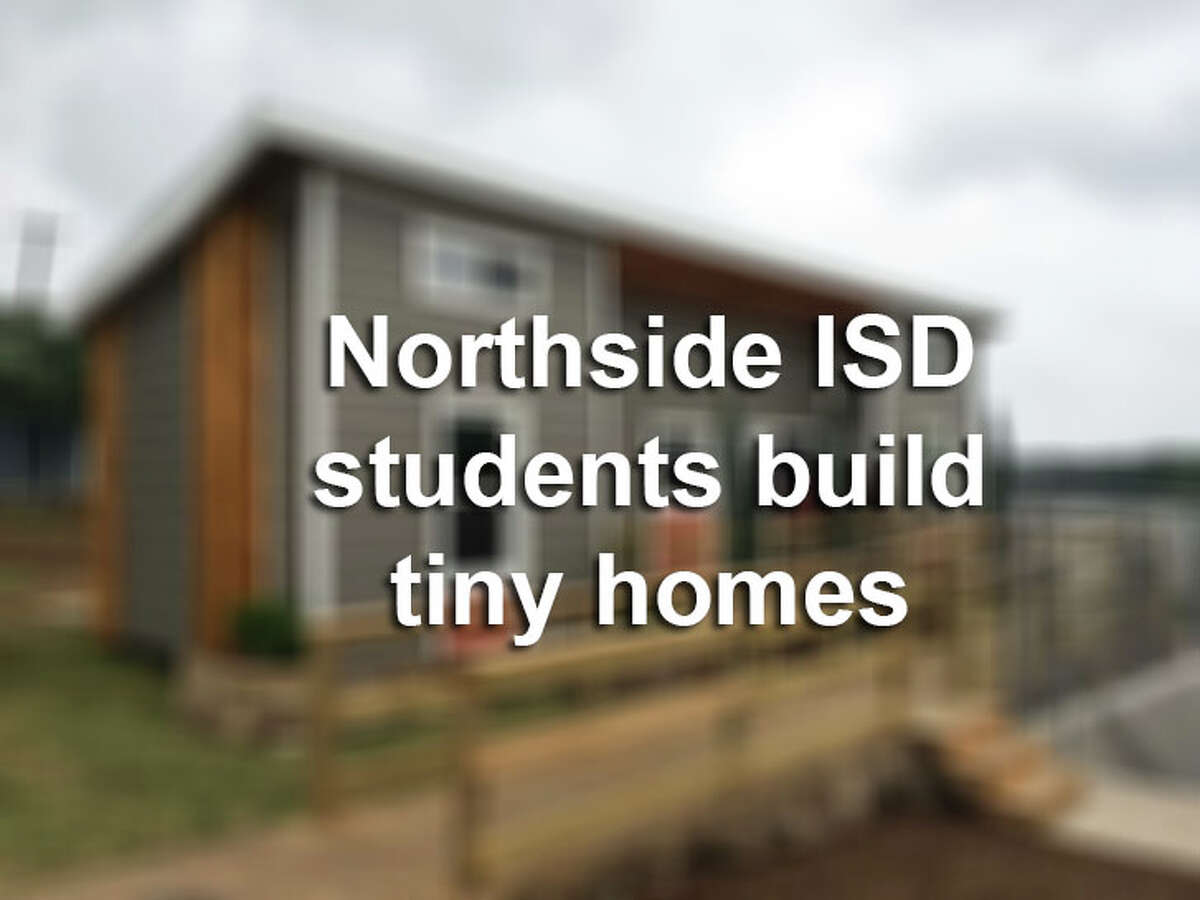 Check out a collection of photos from a competition where high school students build tiny homes for an auction.