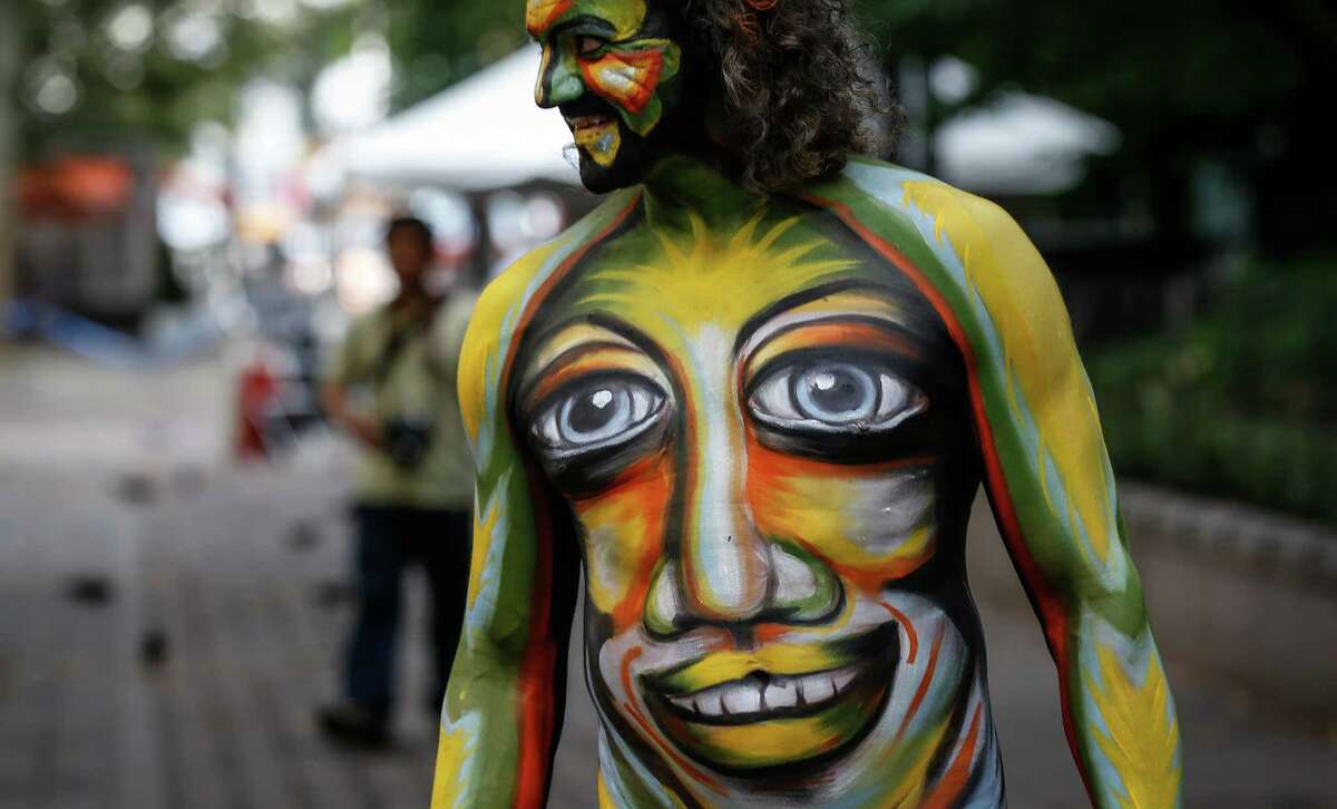 The American Association for Nude Recreation is encouraging people this Halloween to embrace the practice of body painting in lieu of costumes. See more examples of eye-popping body paint jobs across the world....