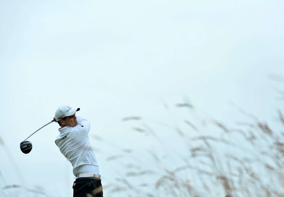 US golfer Zach Johnson watches his shot from the 16th tee during his final round 66, on day five of the 2015 British Open Golf Championship on The Old Course at St Andrews in Scotland, on July 20, 2015. The weather-affected championship, finishes on Monday for only the second time in 155 years. AFP PHOTO / GLYN KIRKGLYN KIRK/AFP/Getty Images