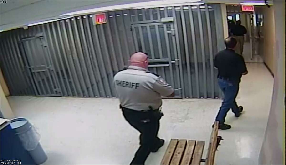 Video still from Waller County Jail, June 13, 2015: More emergency officials respond as CPR is being performed.