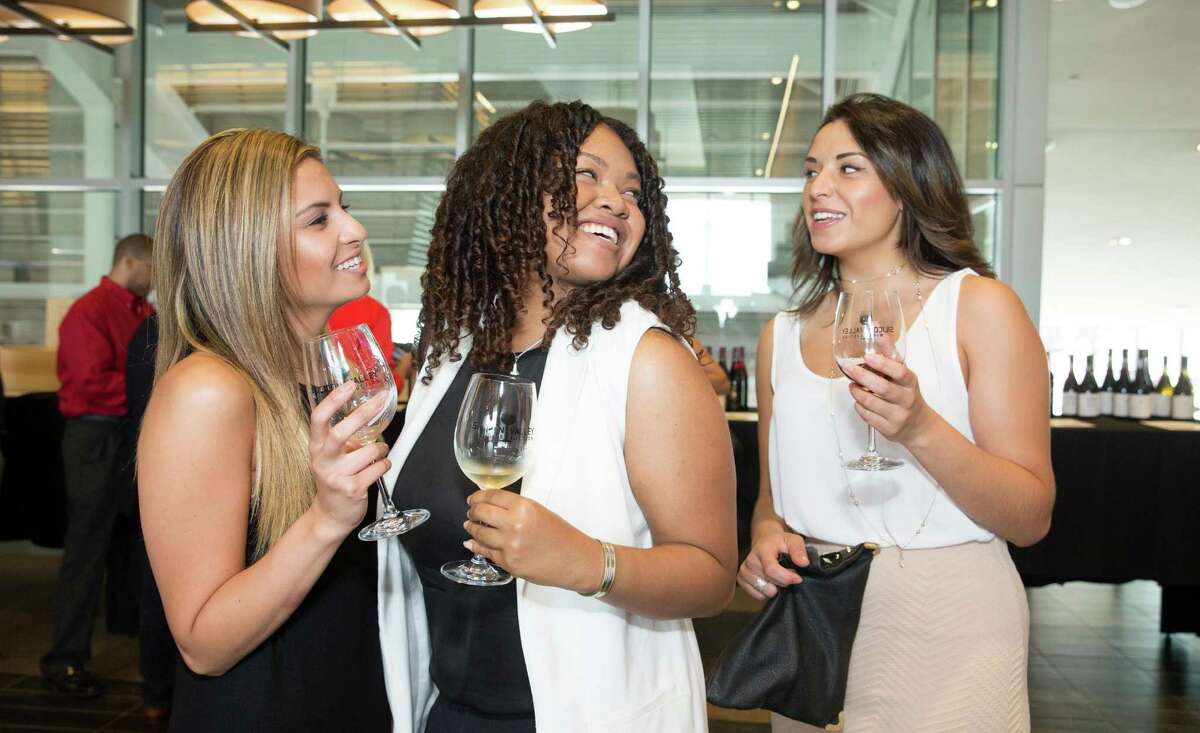 Victoria Astari, Mikaela Martin and Margie Galeano at the inaugural Silicon Valley Wine Auction on June 20, 2015.