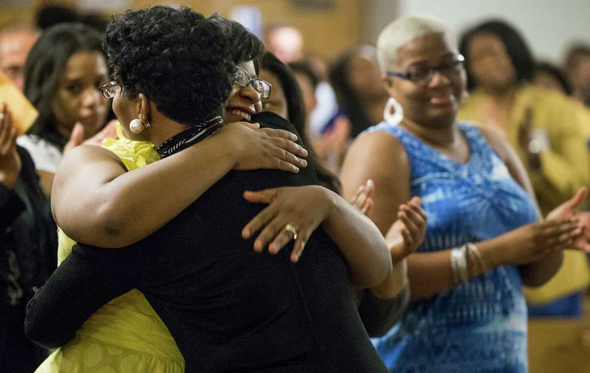 Geneva Reed-Veal, mother of Sandra Bland, embraces her daughter, Sharon Cooper, during a memorial service for Bland at All Faiths Chapel on the campus of Prairie View A&M University on Tuesday, July 21, 2015, in Houston. Bland, a 28-year-old African American woman, was arrested July 10, after being stopped by a Department of Public Safety trooper for failing to signal a lane change. A DPS spokesman said she was arrested after becoming "uncooperative" and kicking the trooper. Three days later, she was found hanging from a ligature in her cell made from a plastic bag.