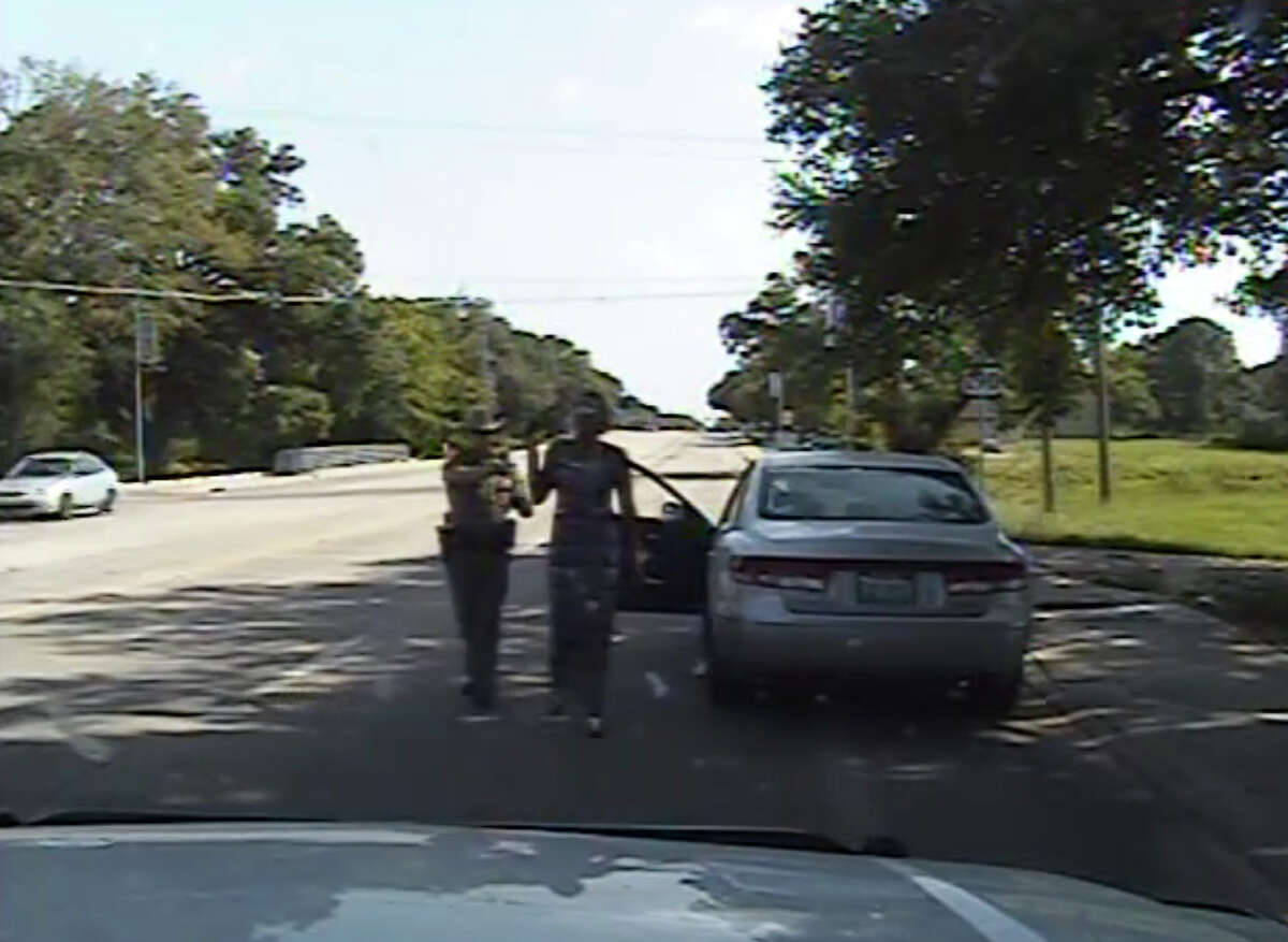 After the trooper hands Bland the written warning, he remarks that she seems irritated. Bland says she was irritated because she was stopped for changing lanes to get out of the path of the trooper's car. The conversation turns hostile when the officer asks Bland to put out her cigarette and she asks why she can't smoke in her own car. The trooper then orders Bland to get out of the car. She refuses, and he tells her she is under arrest. Further refusals to get out bring a threat from the trooper to drag her out. He then pulls a stun gun and says, "I will light you up." When she finally steps out of the vehicle, the trooper orders her to the side of the road. There, the confrontation continues off-camera but is still audible. The two keep yelling at each other as the officer tries to put Bland in handcuffs and waits for other troopers to arrive. Out of the camera's view, Bland continues protesting her arrest, repeatedly using expletives and calling the officer a "pussy." At one point, she screams that he's about to break her wrists and complains that he knocked her head into the ground. In response to questions about gaps and overlaps in the recording, the Texas Department of Public Safety said the video was not edited or manipulated. Department spokesman Tom Vinger said Wednesday that glitches in the recording arose when it was uploaded for public viewing. He said the department will repost the footage.