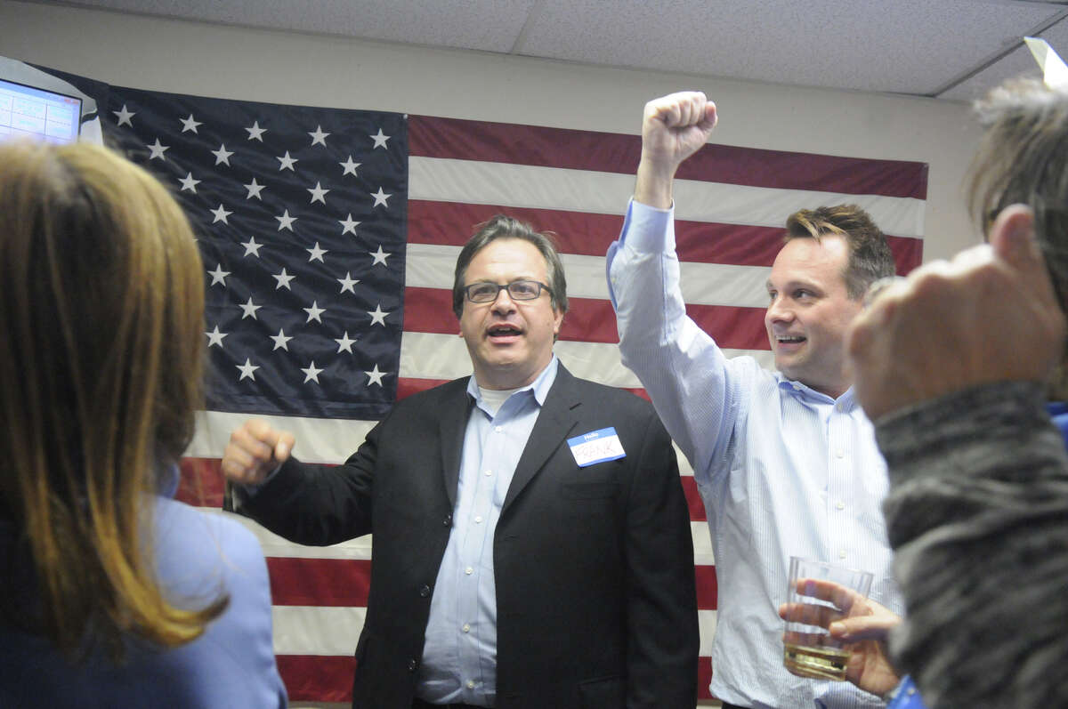 Frank Farricker, Drew Marzullo and Democrats gather at Democratic Headquarters on the Old Post Road in 2014.