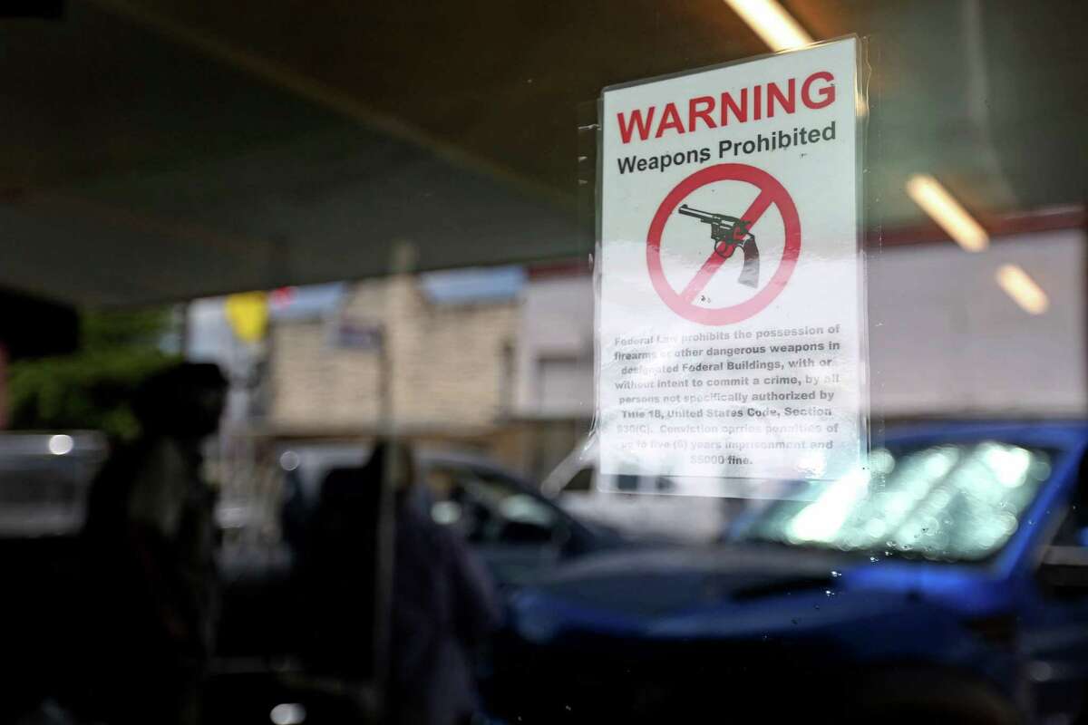 A weapons prohibited sign is posted Wednesday on the window of the U.S. Marine recruitment office on South St. Charles Street ﻿in Brenham. The goal of Arm Our Eagles campaign is to show support for armed forces.﻿