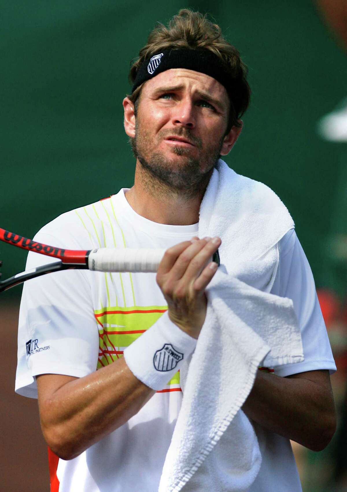 Mardy Fish reacts during a tennis match against Michael Russell during the US Men's Clay Court Championship at River Oaks Country Club Thursday, April 12, 2012, in Houston. Russell won 6-3, 6-1. (Cody Duty / Houston Chronicle)