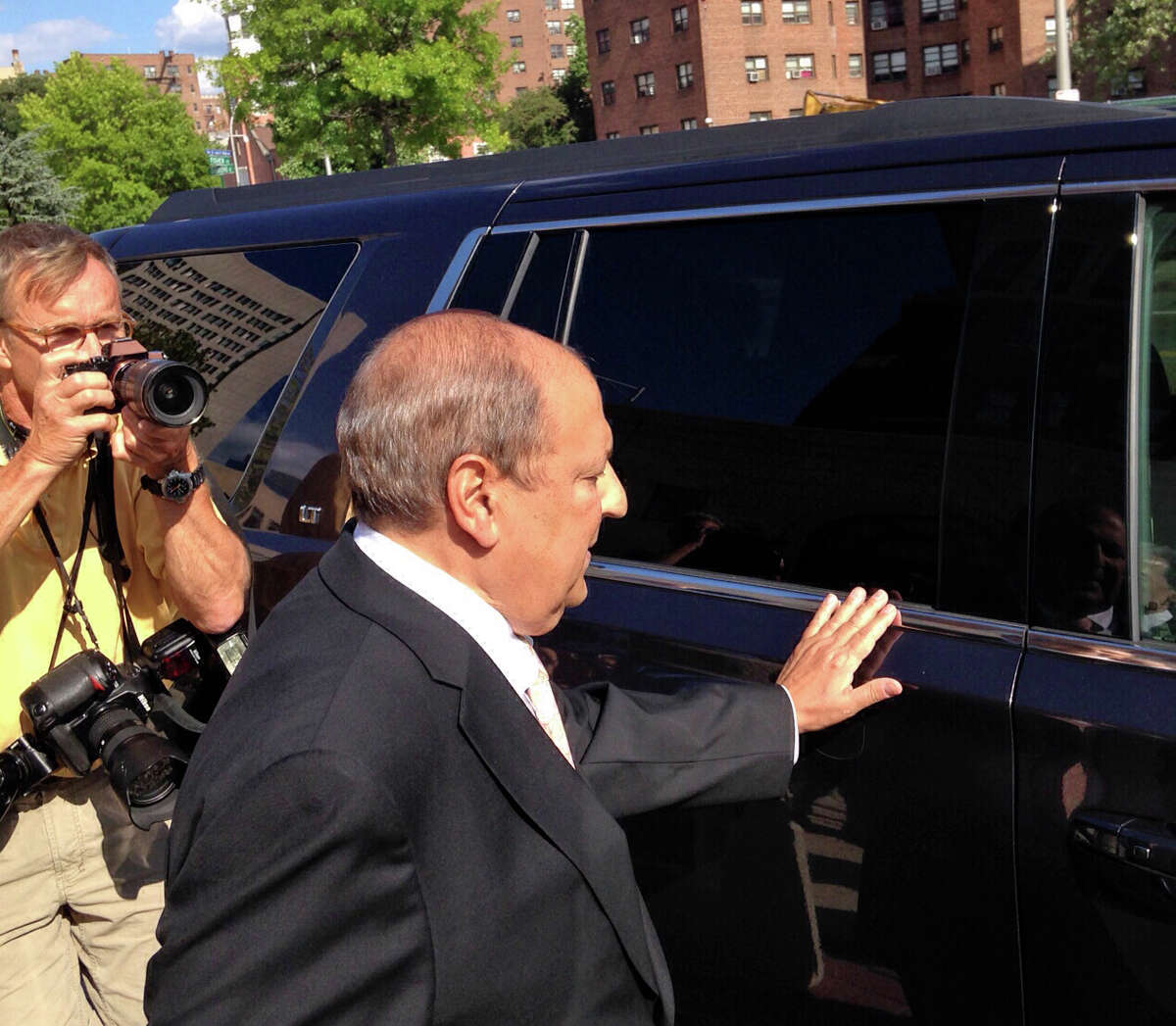 New York State Sen. Thomas Libous, R-Binghamton, leaves federal court in White Plains, N.Y., Wednesday, July 22, 2015. The New York State Senate's deputy majority leader, Libous was found guilty of lying to the FBI about arranging a high-paying job for his son. Under state law, the felony conviction means Thomas Libous loses his seat. (AP Photo/Jim Fitzgerald) ORG XMIT: NYR106