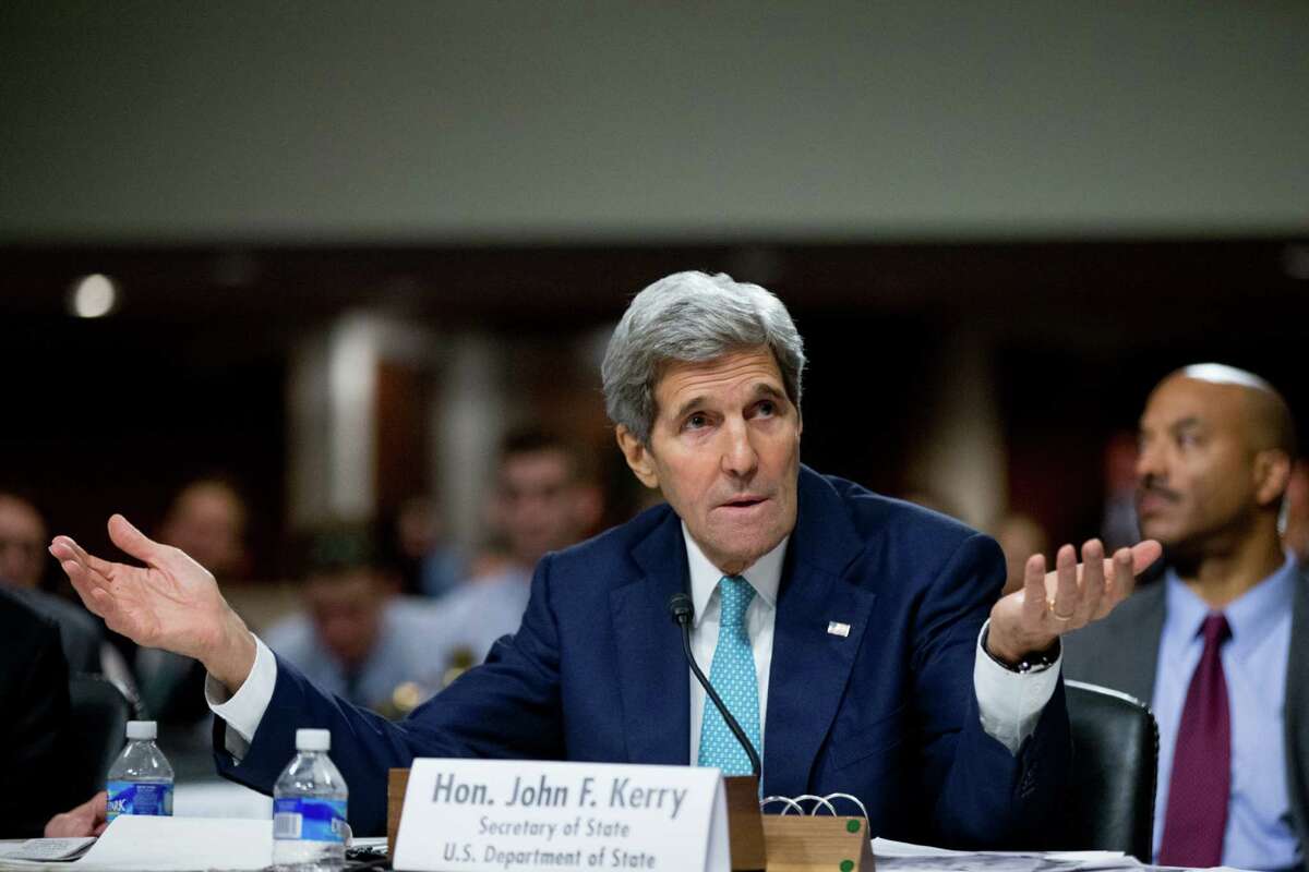 Secretary of State John Kerry, accompanied by Secretary of Treasury Jack Lew, and Secretary of Energy Ernest Moniz, testifies before a Senate Foreign Relations Committee hearing on Capitol Hill, in Washington, Thursday, July 23, 2015, to review the Iran nuclear agreement.