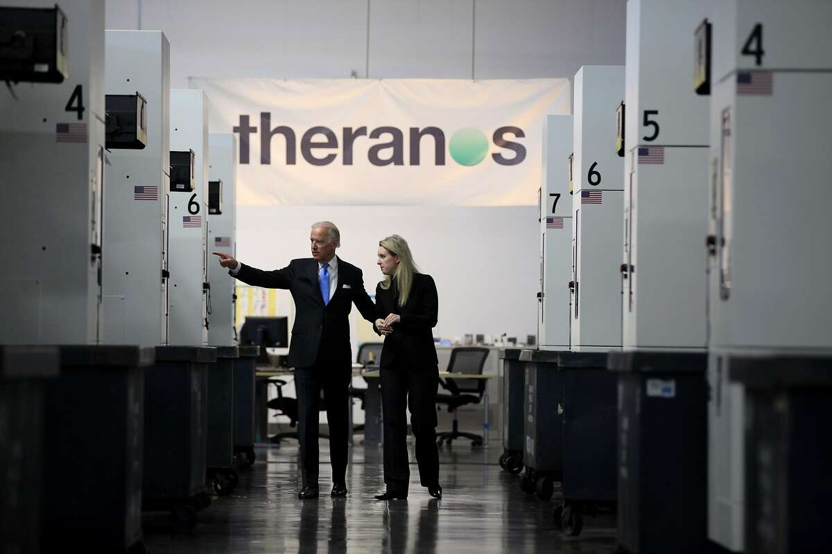 Vice President Joe Biden takes a tour of a Theranos production facility with Elizabeth Holmes, CEO of Theranos, in Newark, California, on Thursday, July 23, 2015.
