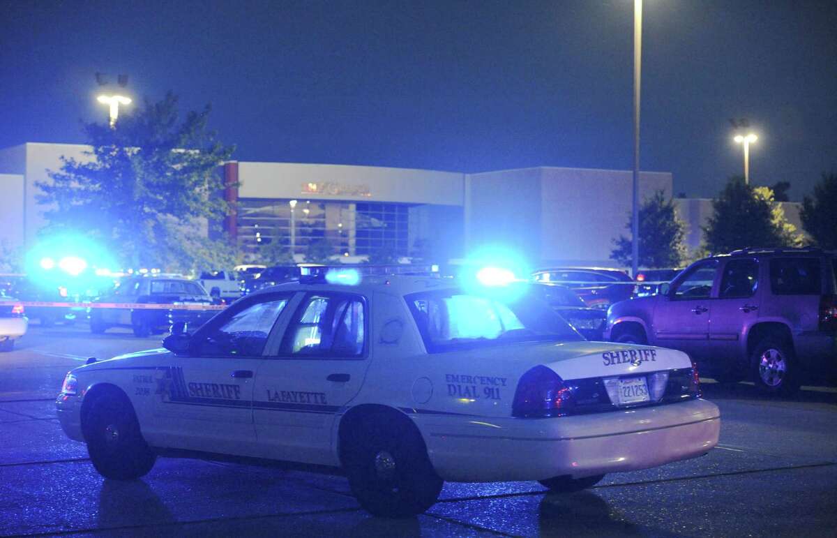 A law enforcement vehicle blocks an entrance at the Grand Theatre in Lafayette, La., on Thursday.