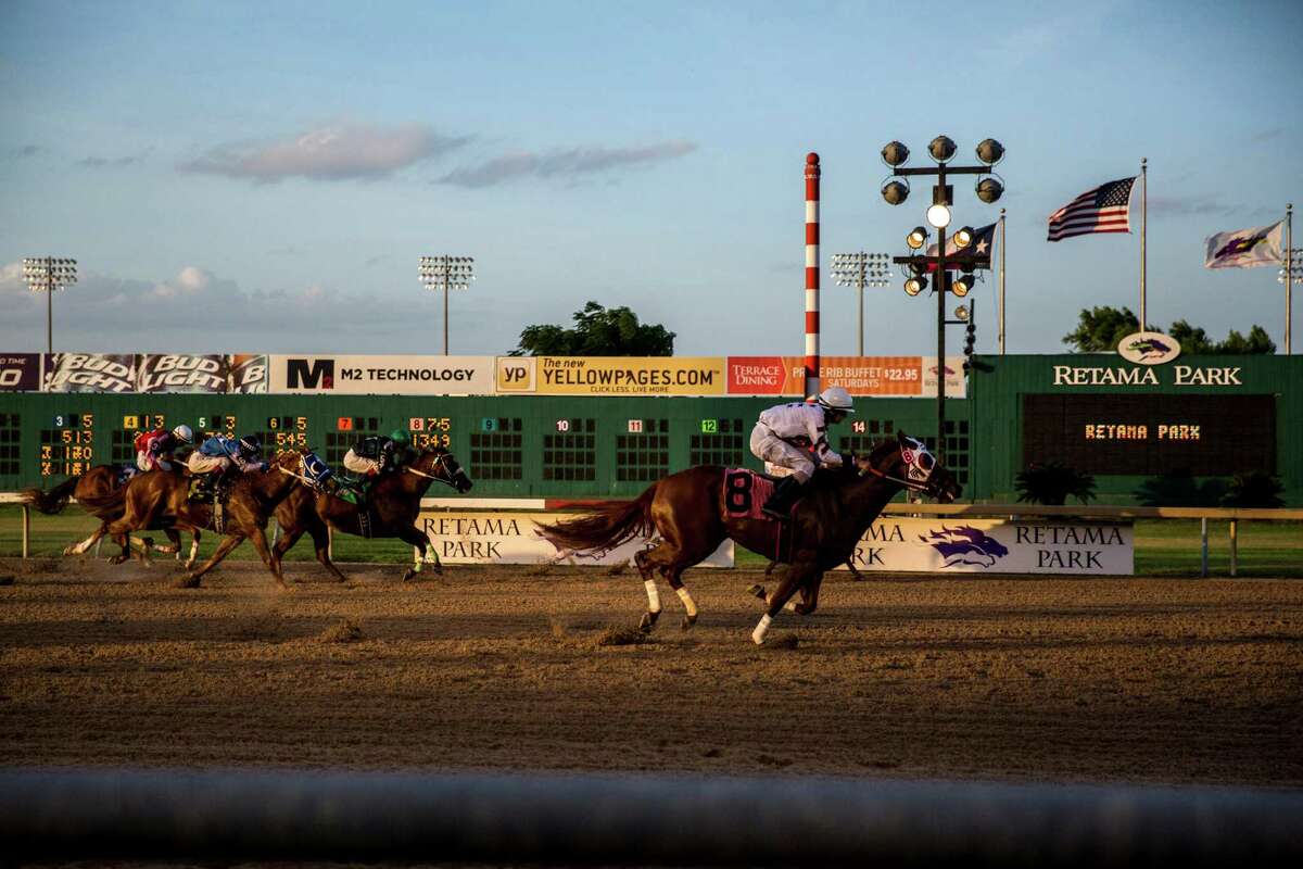 Tnb Rockin Chick, riden by Donald Guynes, wins the fourth race at Retama Park in Selma on July 17, 2015.