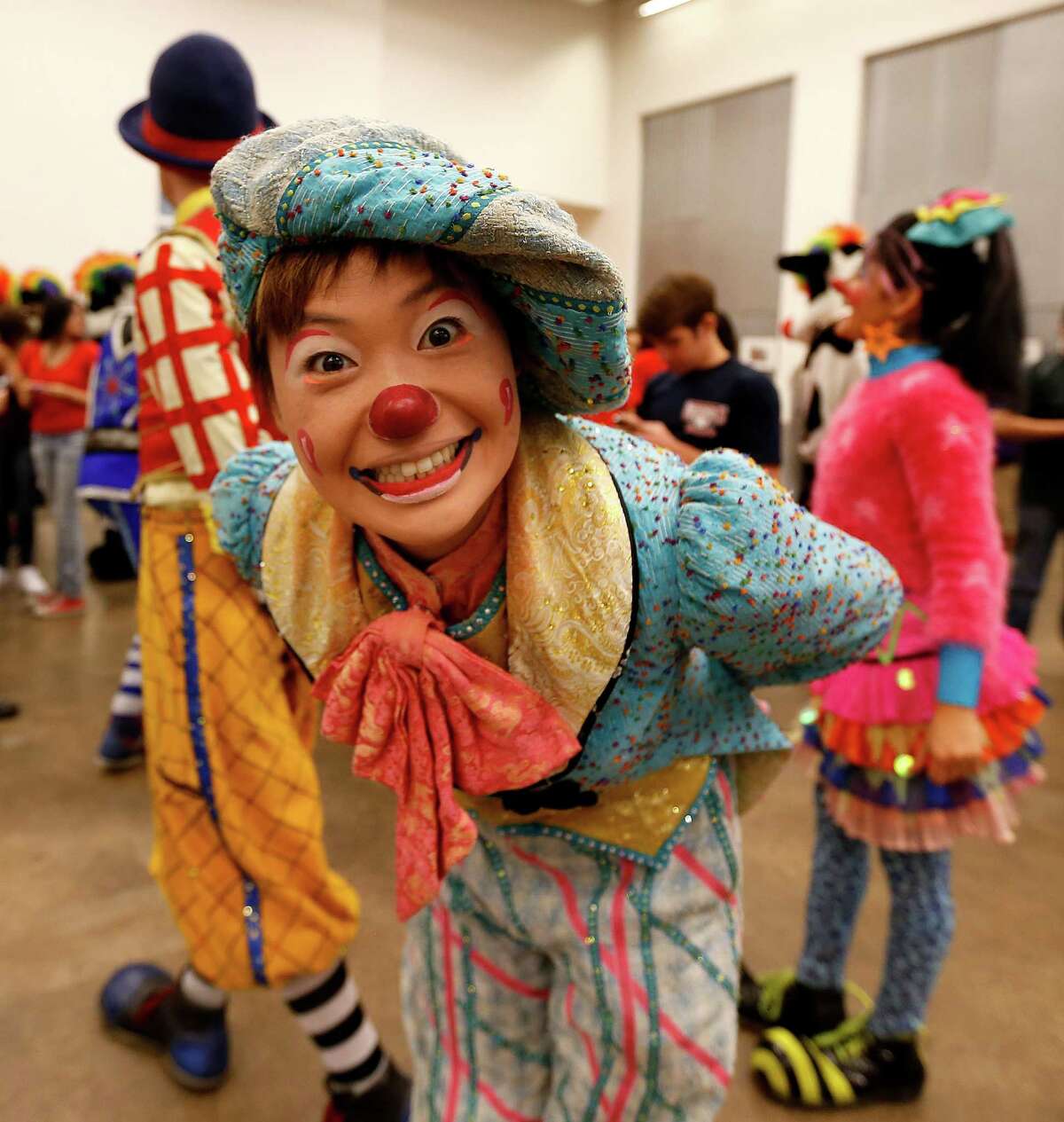 Ringling Bros. and Barnum & Bailey Circus clown Mariko Iwasa performed a mini-show for volunteers at the Houston Food Bank last week. The circus continues this weekend.