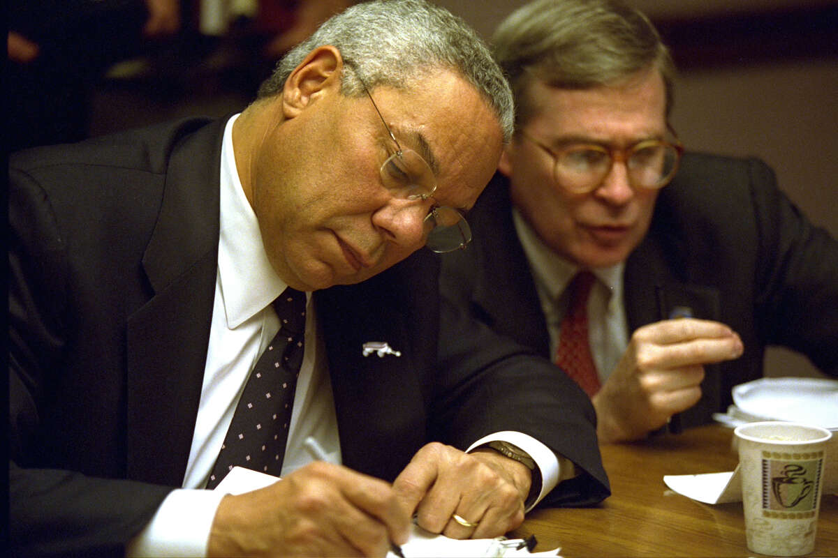 Editor's note: The following caption remains unedited and is in the original form as released by the U.S. National Archives. RC: Peoc Room Meetings on the Dayt of the Terrorist Attacks. Powell and Rice. PEOC